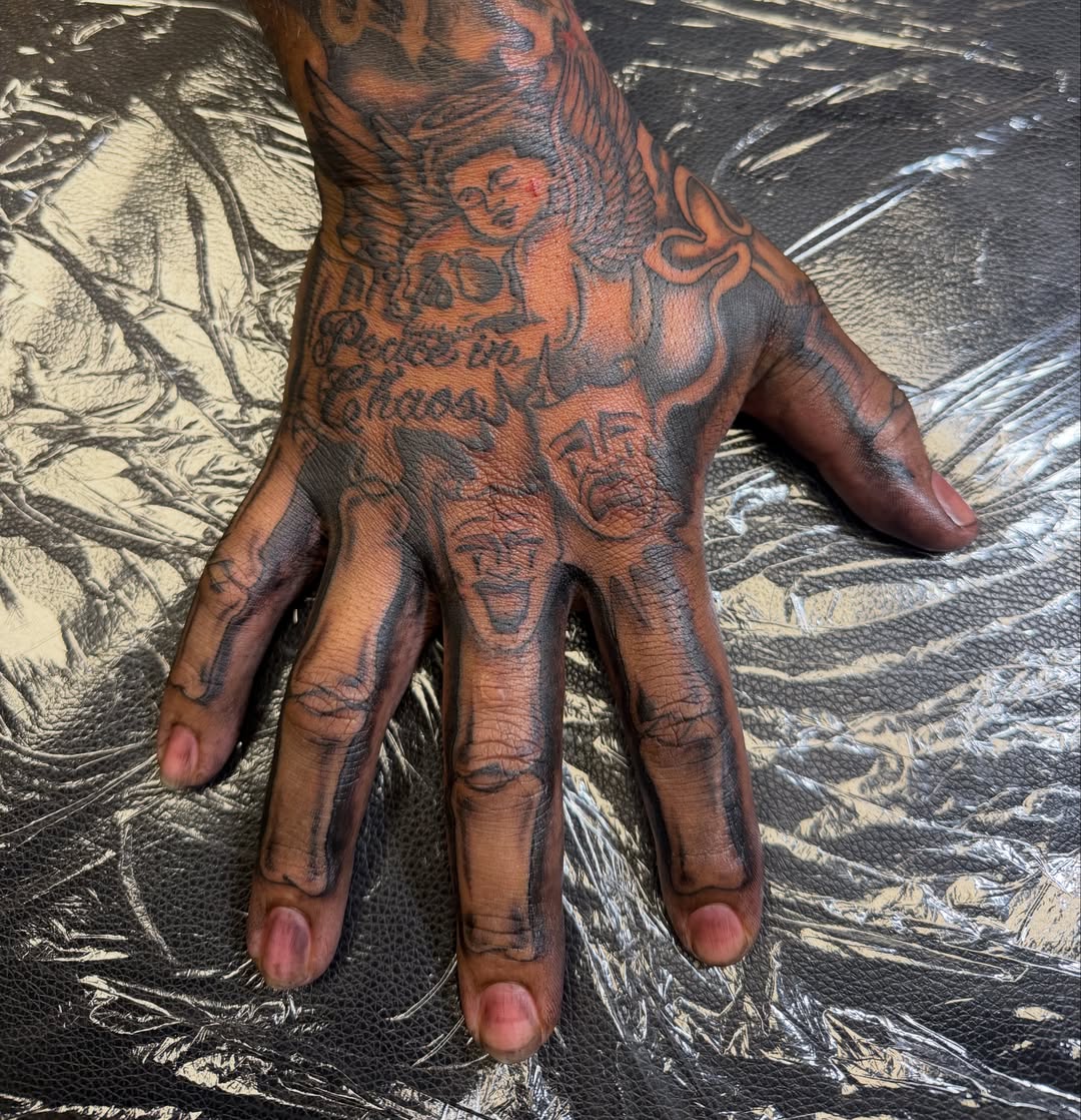 Angelic figure American traditional tattoo on the hand by Humberto Vega