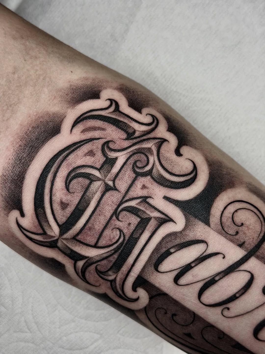 Tattoo by @marcusmartineztattoo β lettering_script, black_and_grey