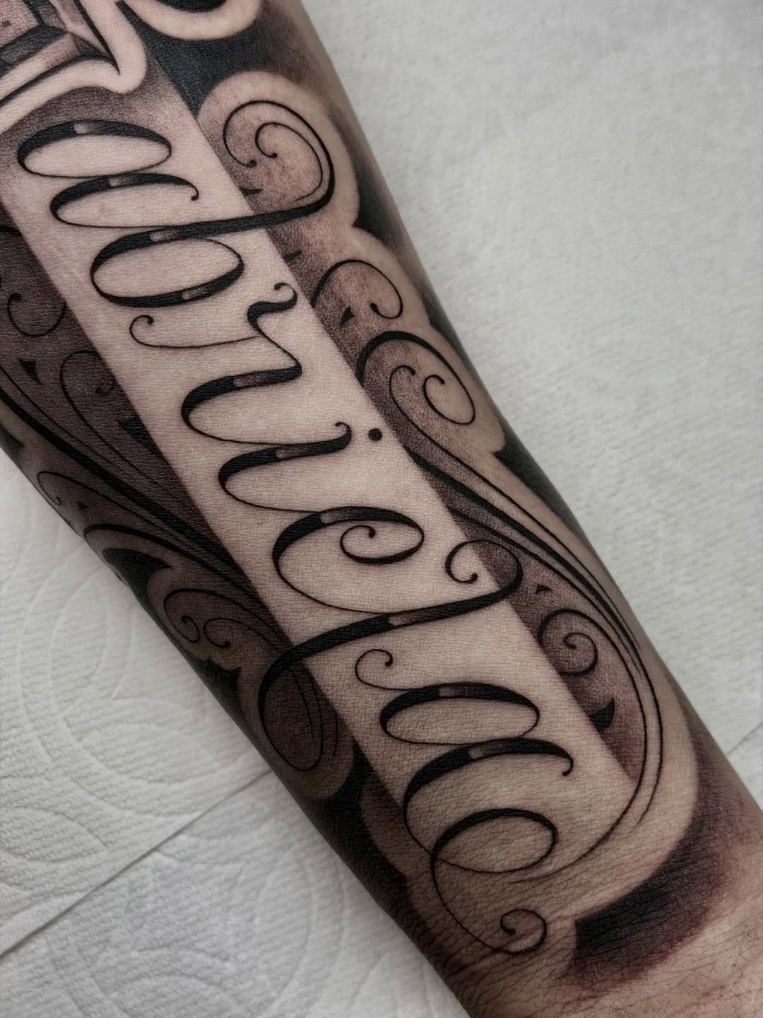 Tattoo by @marcusmartineztattoo β lettering_script, black_and_grey