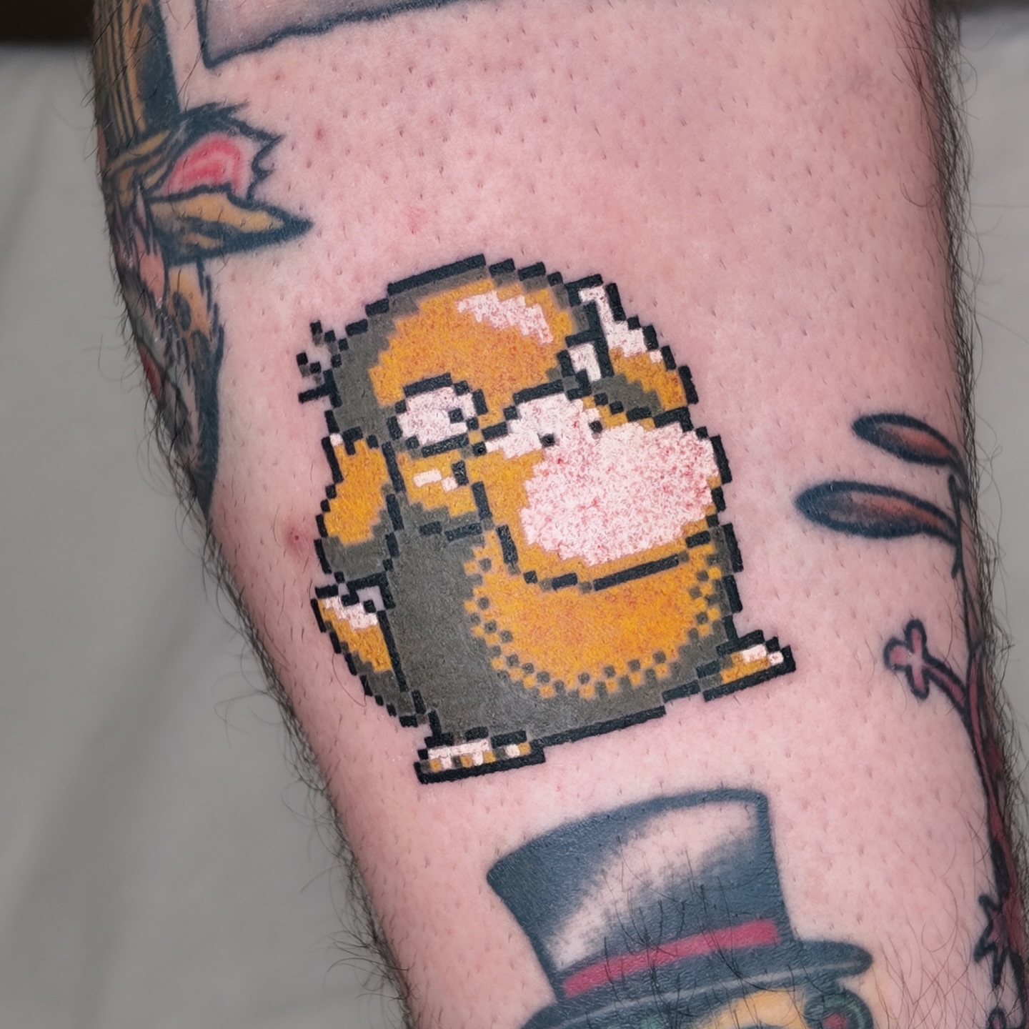 Pixelated character dotwork tattoo on the forearm by m r p i x e l ๐ธ๐ฌ