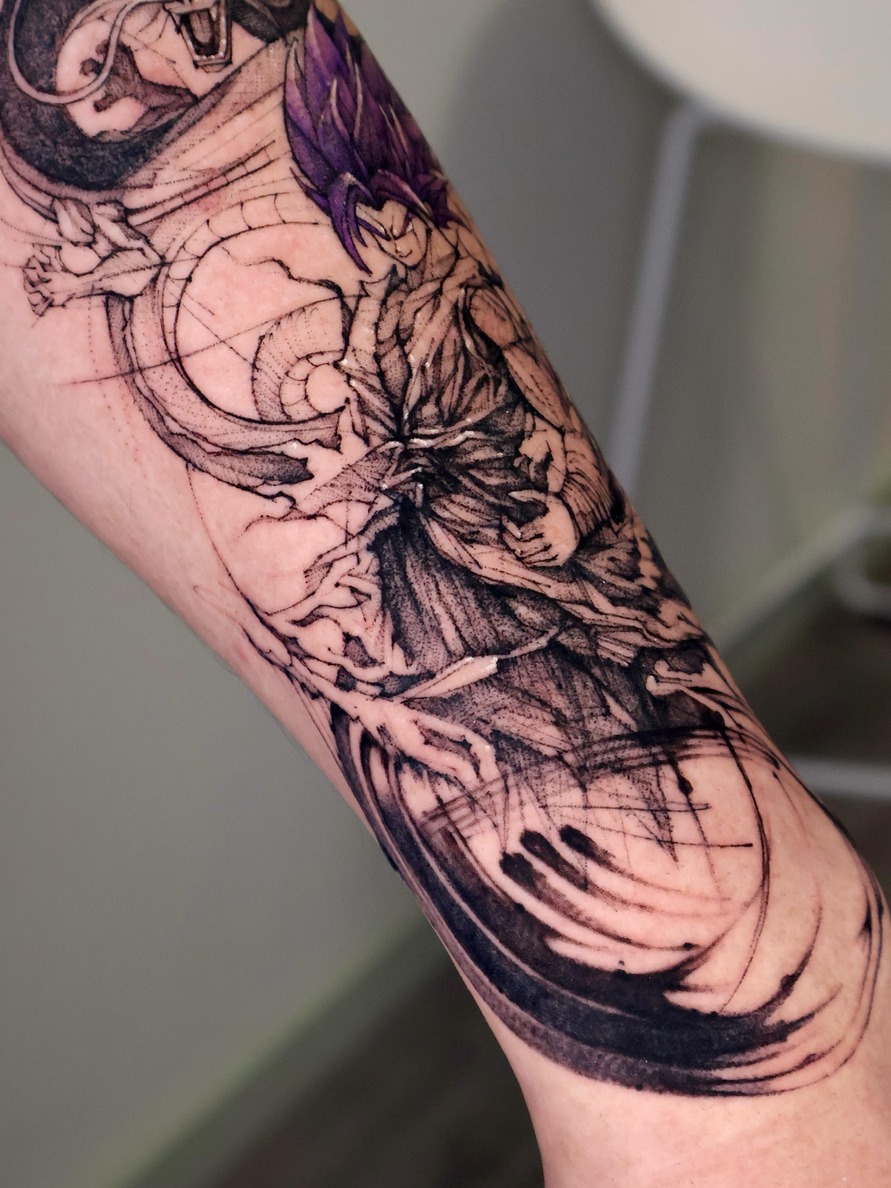 Dragon ball character black and grey tattoo on the forearm by Tadi