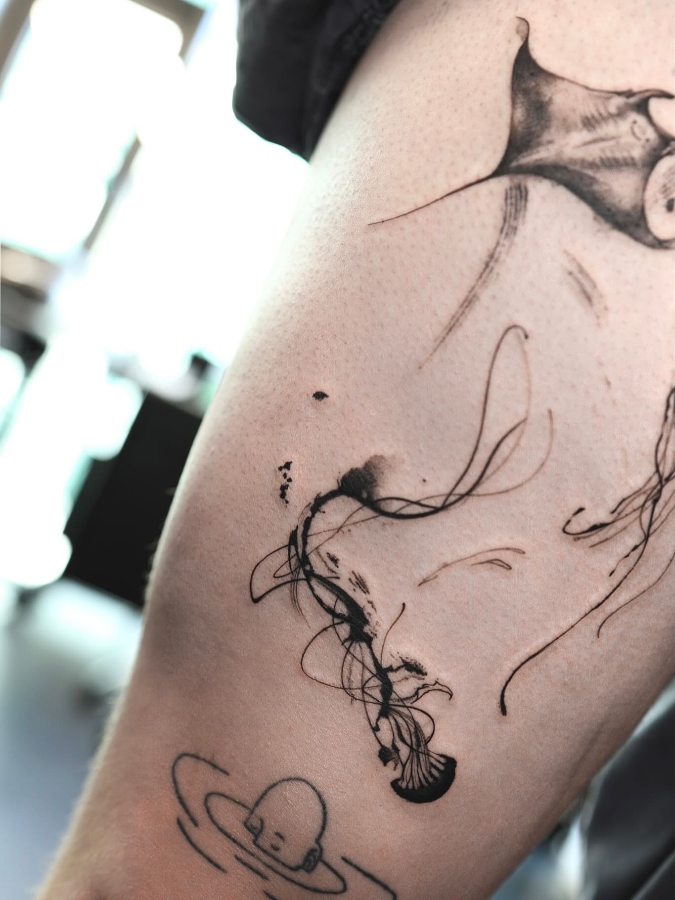 Abstract face surrealism tattoo on the thigh by 초현실과 현실 그 사이를 그리다.
