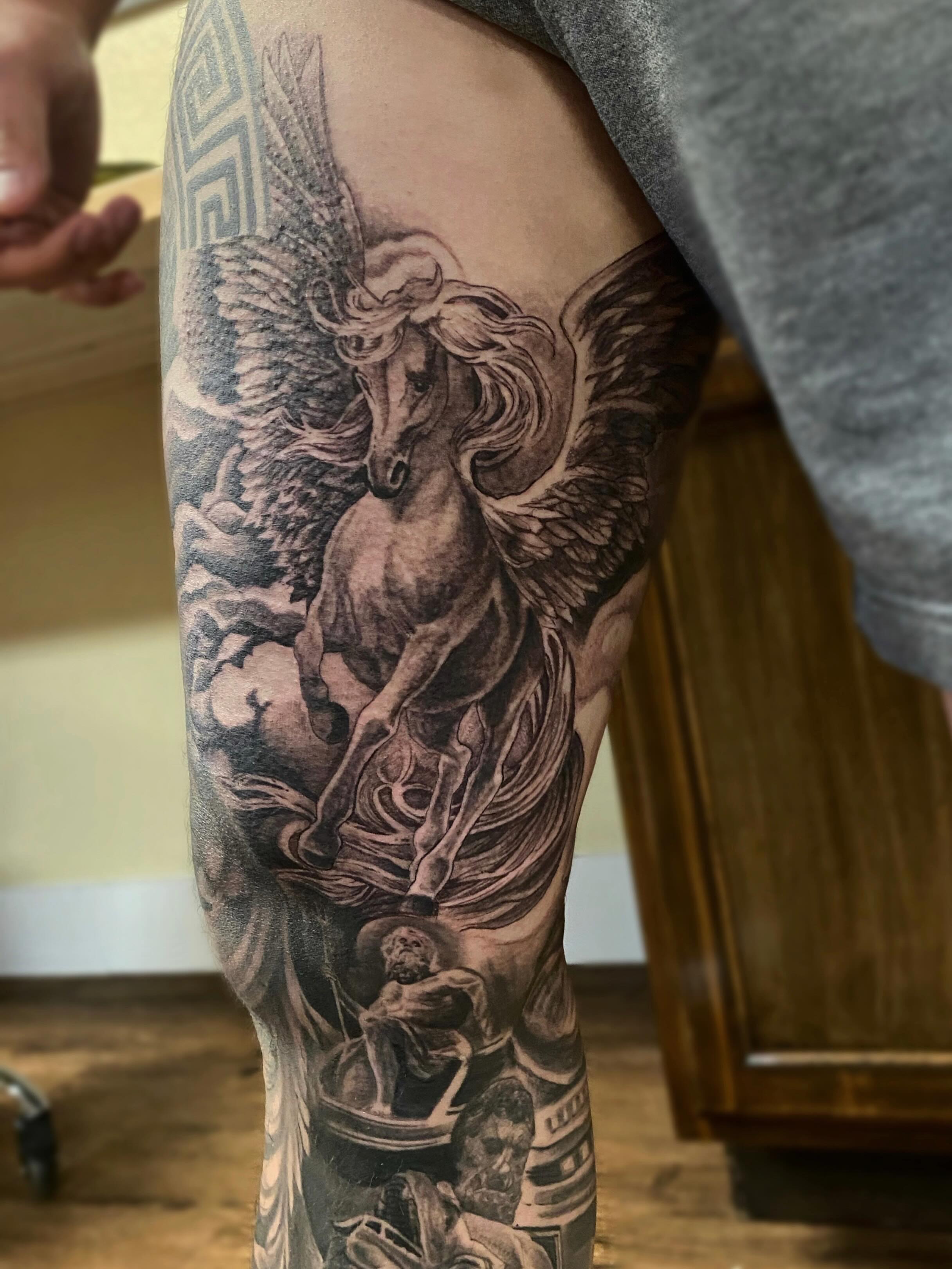 Pegasus and centaur realism tattoo on the thigh by Mathilda Quynh