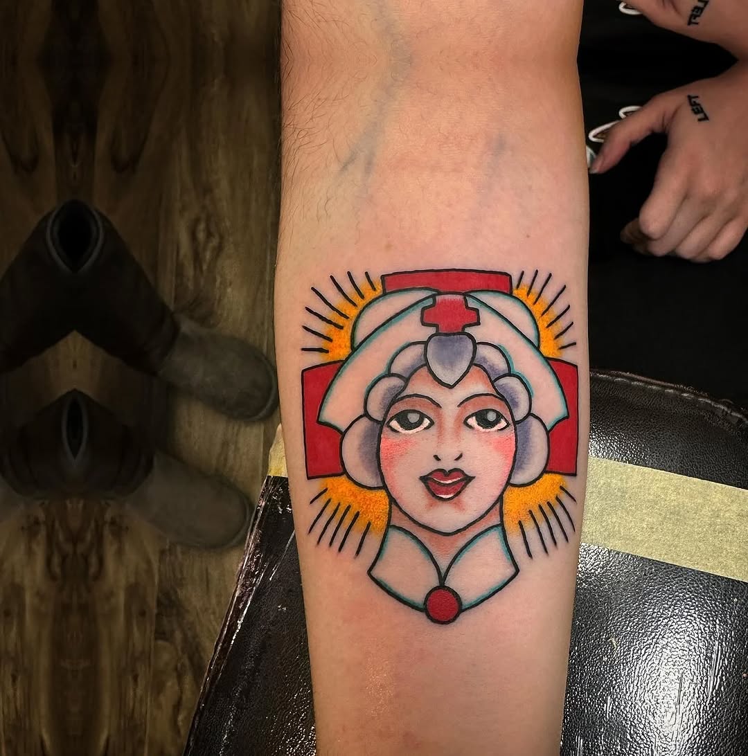 Nurse portrait neo-traditional tattoo on the forearm by Jaleel Trantow