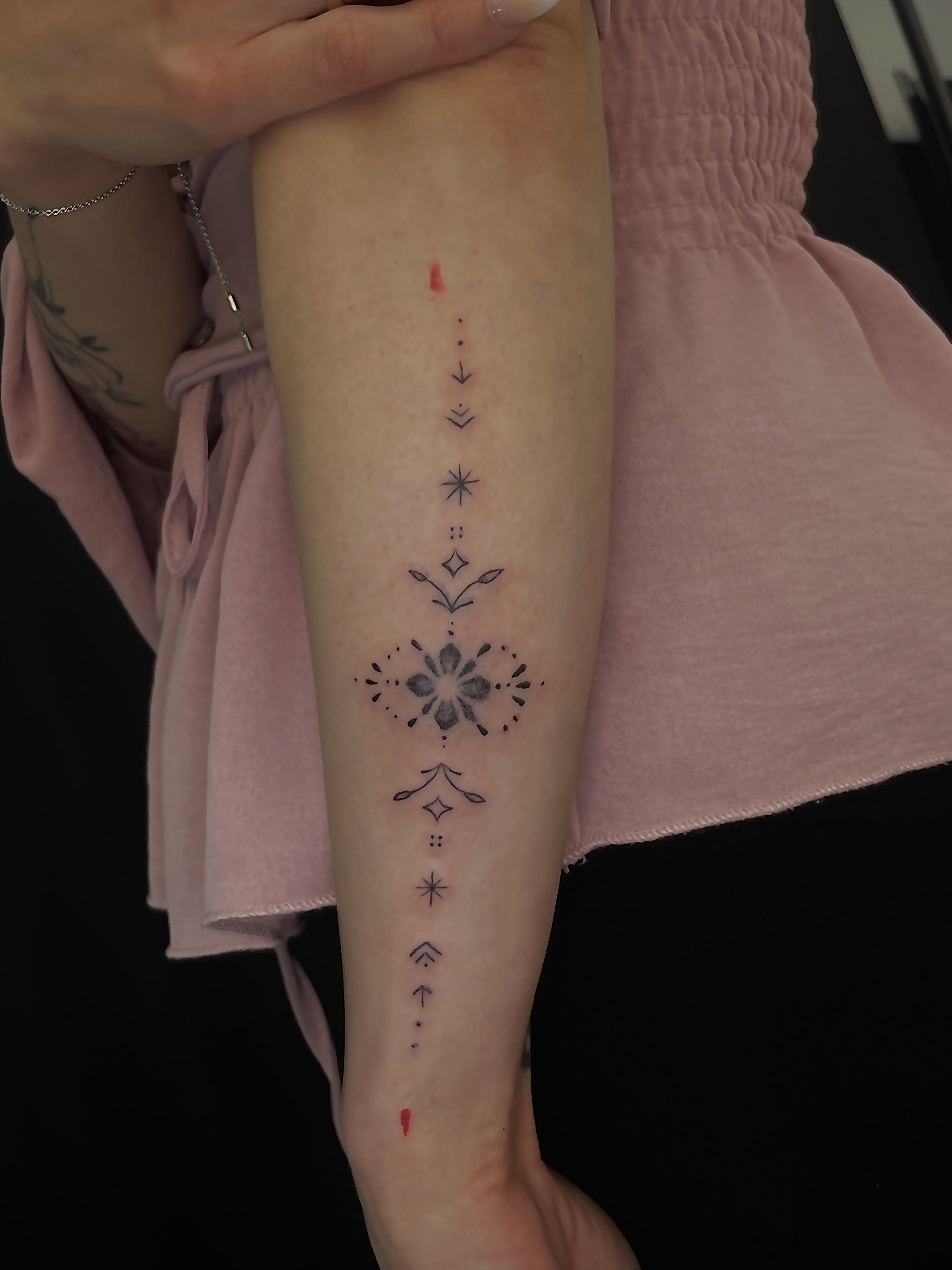 Tattoo by @amber_noir_tattoo — dotwork, geometric