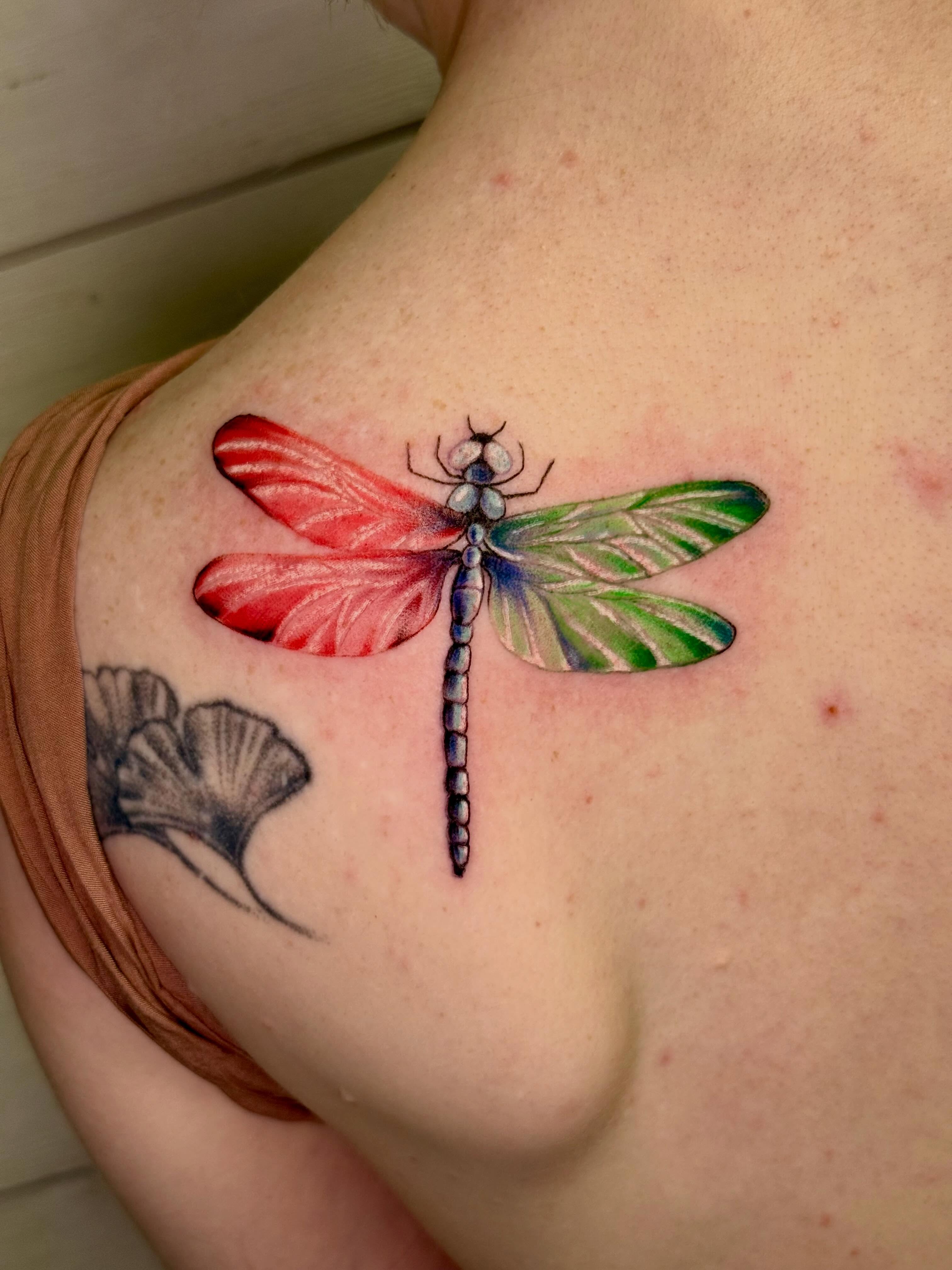 Dragonfly realism tattoo on the shoulder by Diana Muresan