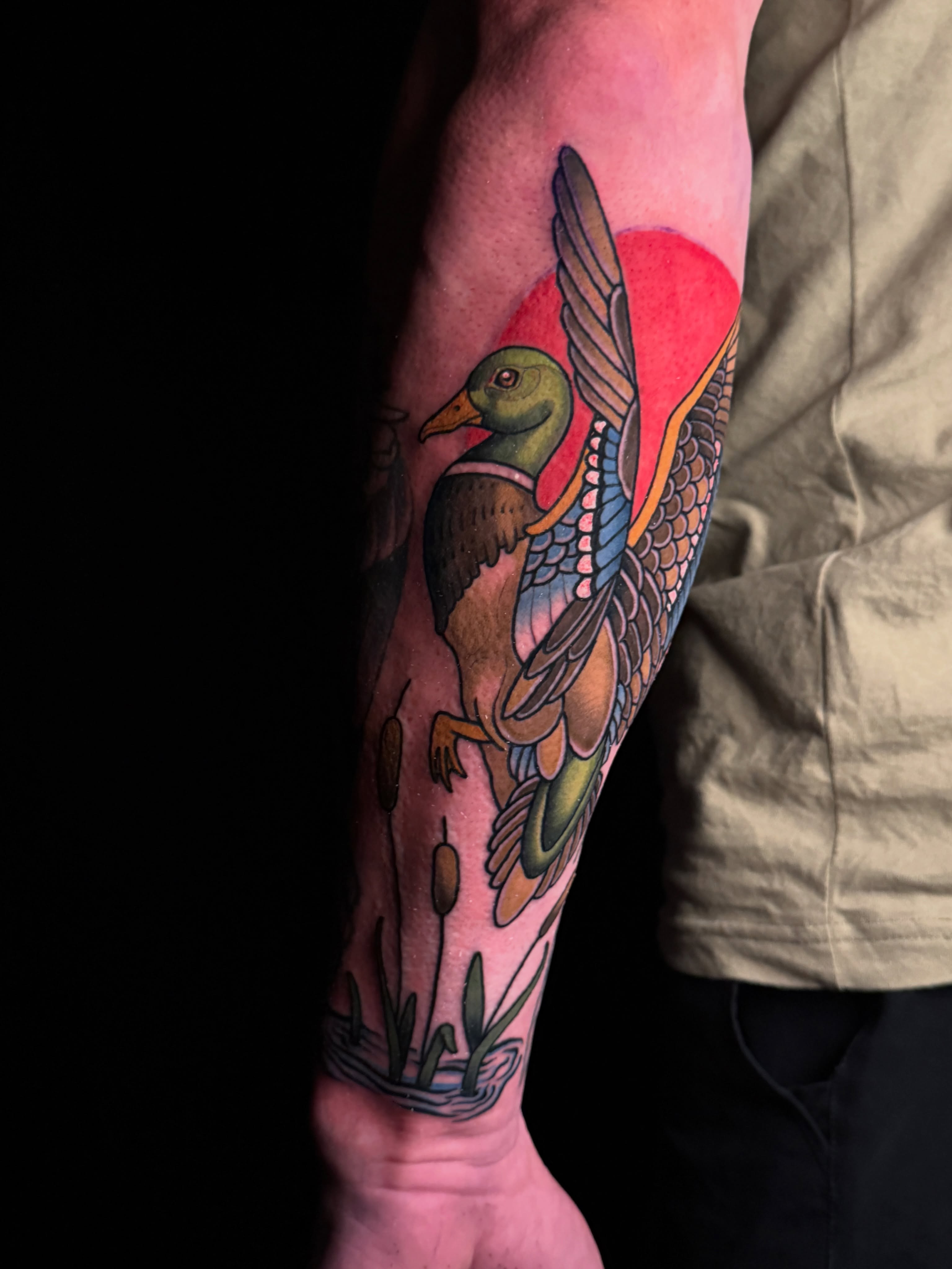 Duck American traditional tattoo on the forearm by Brad Snow