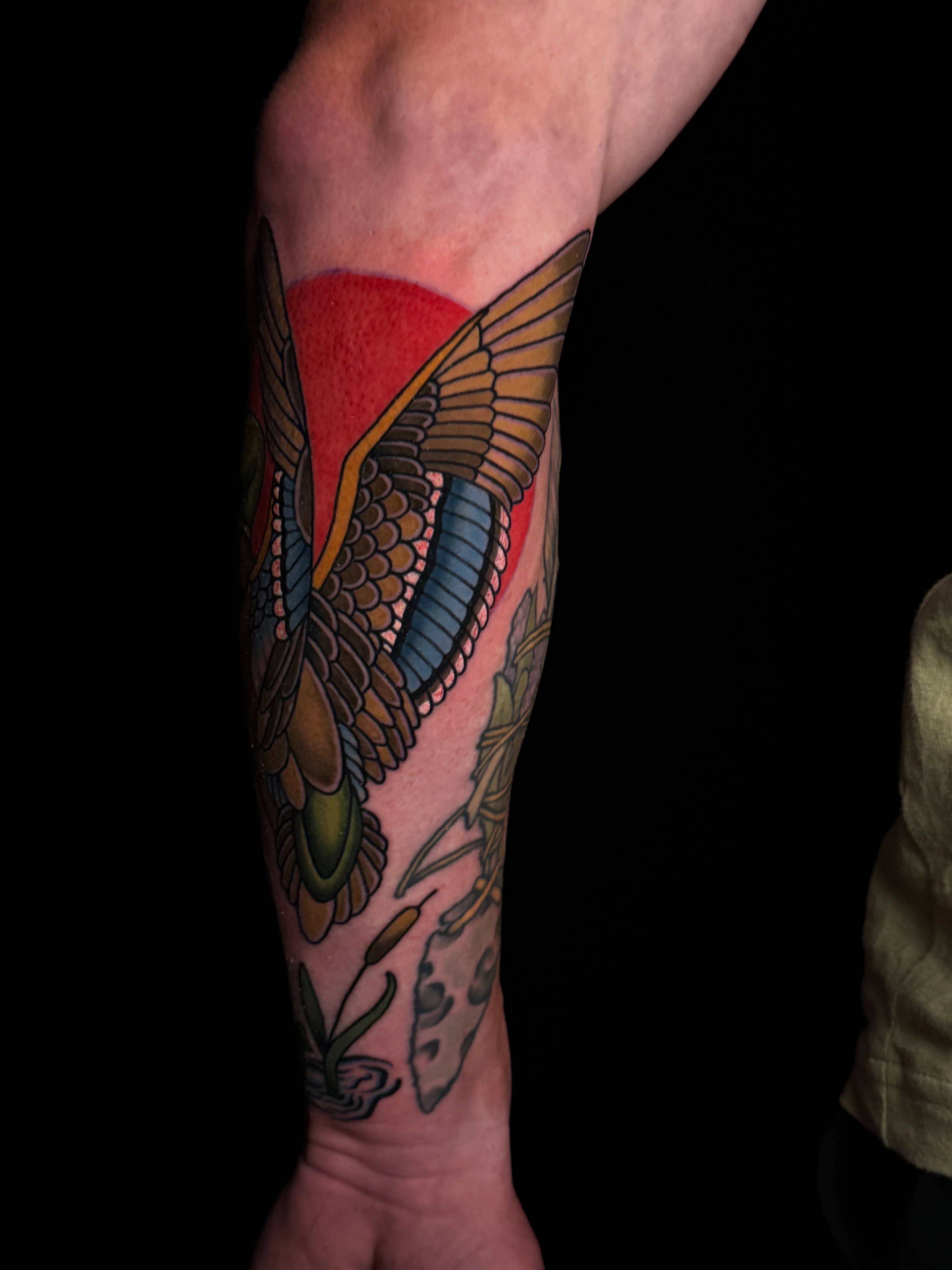 Bird American traditional tattoo on the forearm by Brad Snow