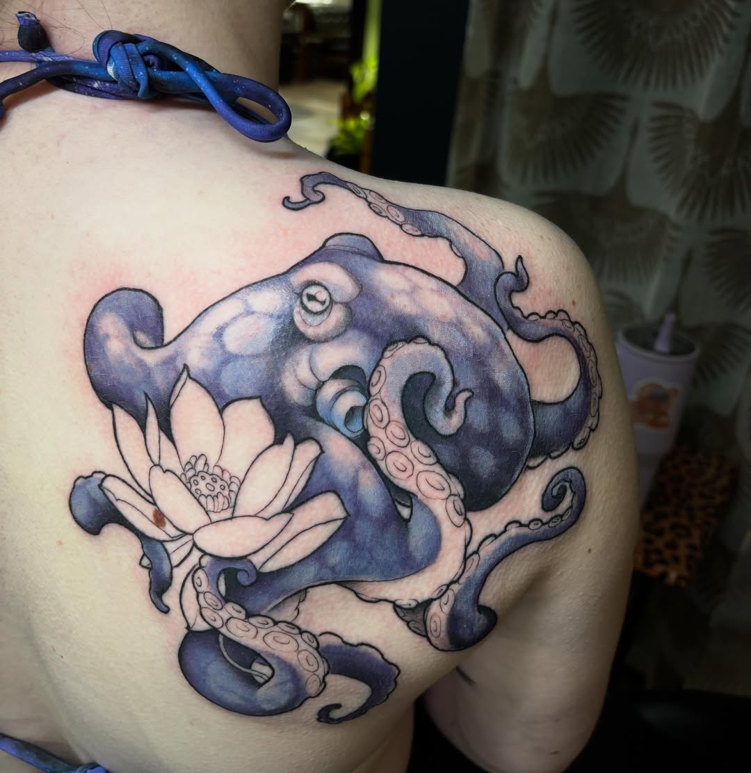 Octopus and lotus realism tattoo on the shoulder by Alex