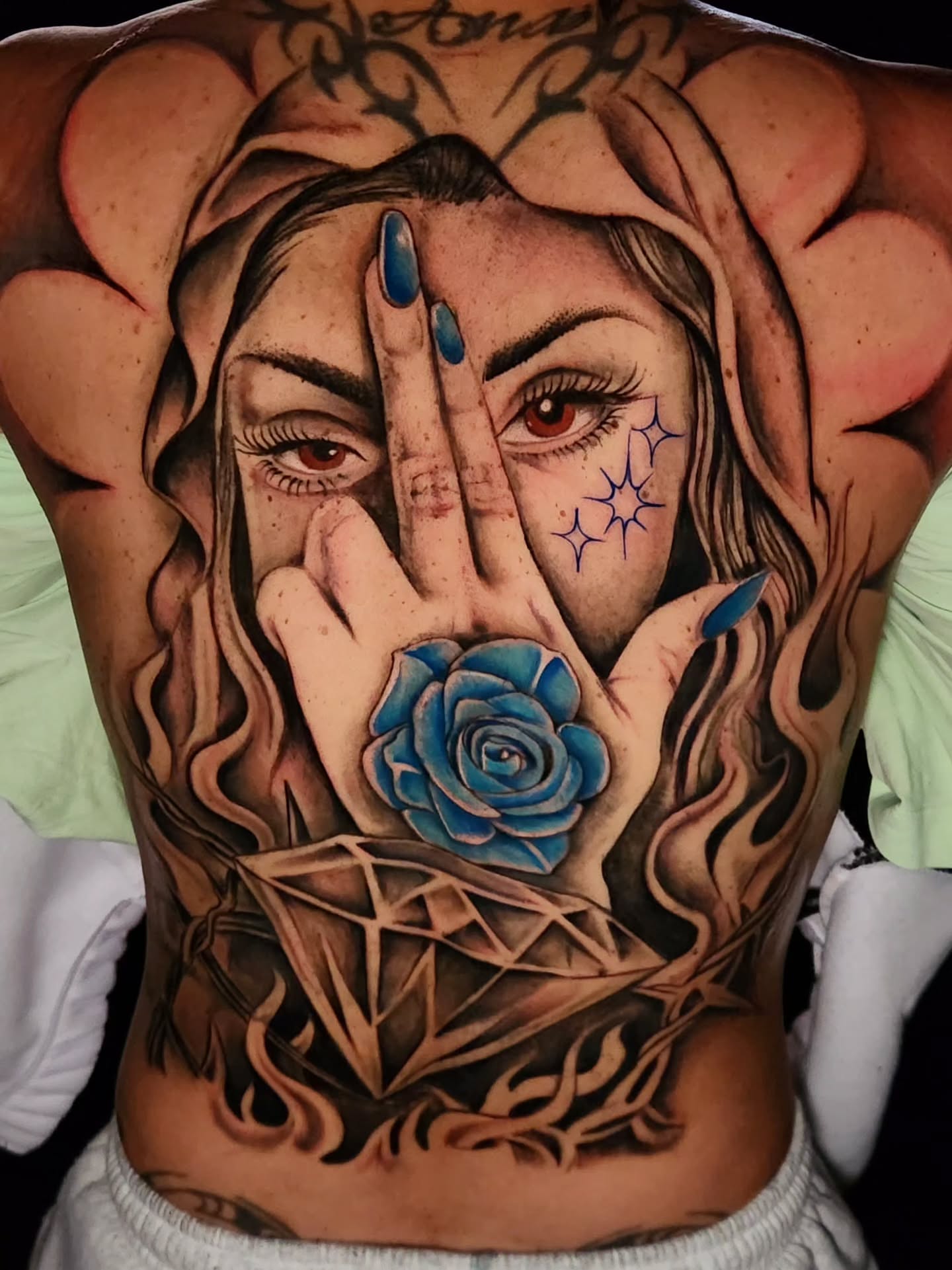 Woman with hand and flower realism tattoo on the chest by 🗣 No Minors🔞‼️‼️‼️