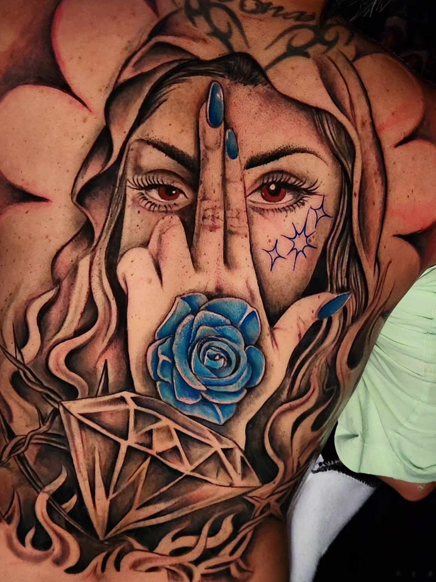 Woman with blue rose realism tattoo on the upper arm by 🗣 No Minors🔞‼️‼️‼️
