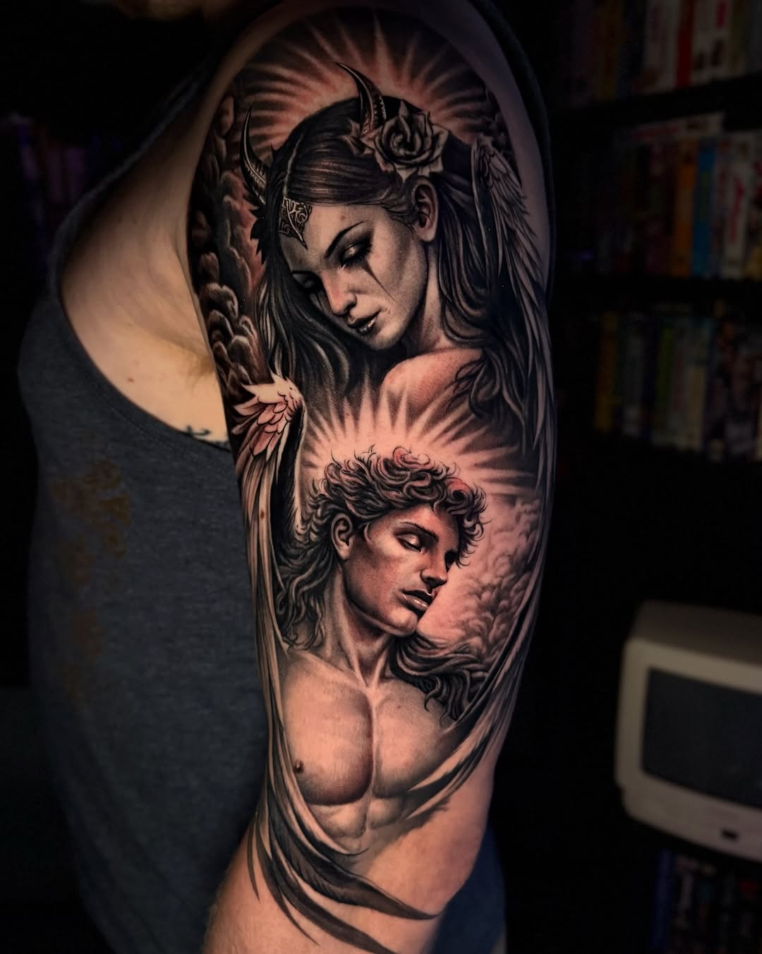 Angelic figures realism tattoo on the forearm by Tommy Nguyen, Eastpointe, Michigan