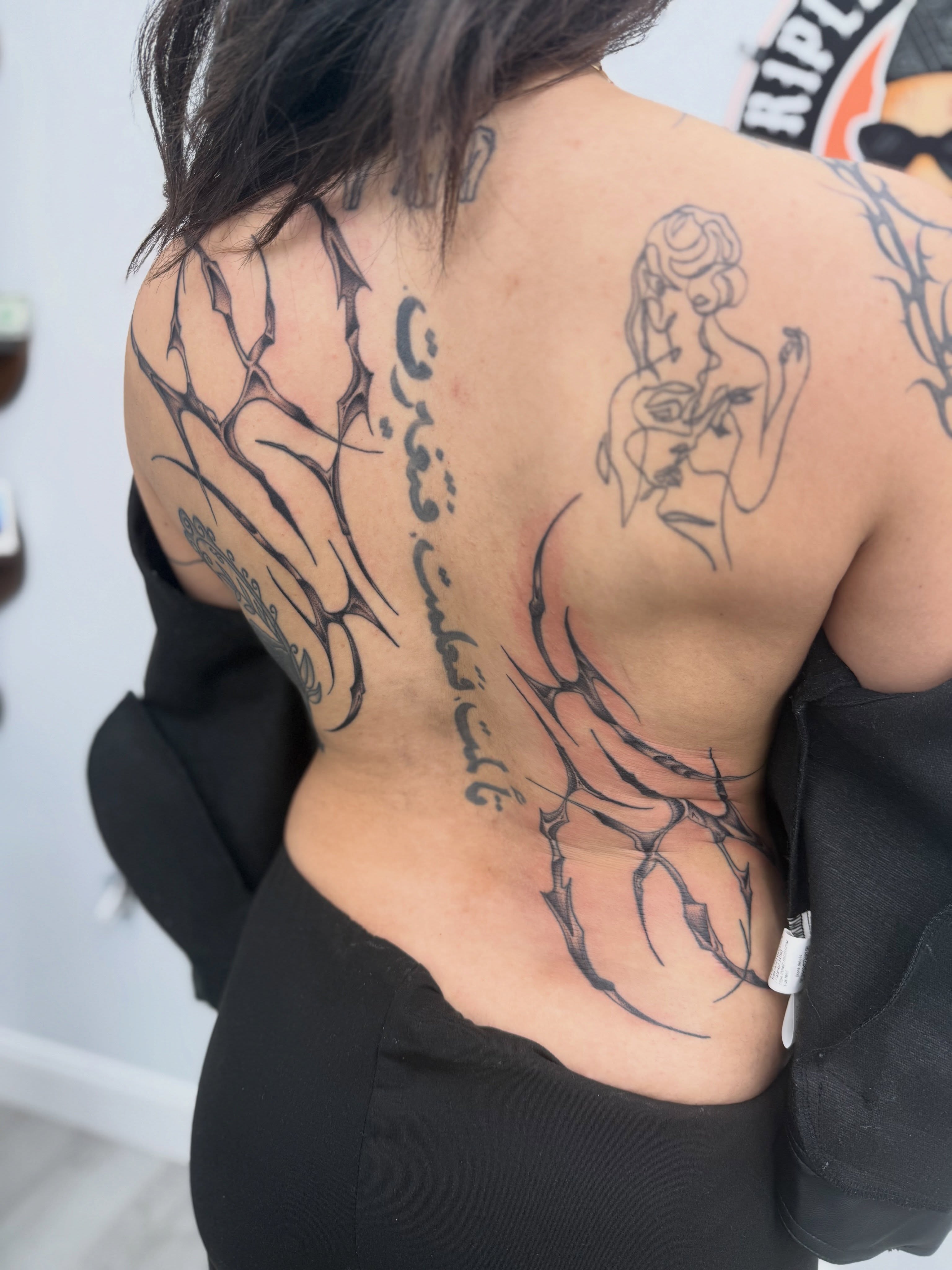 Tattoo by @real_street_tattoos — black_and_grey