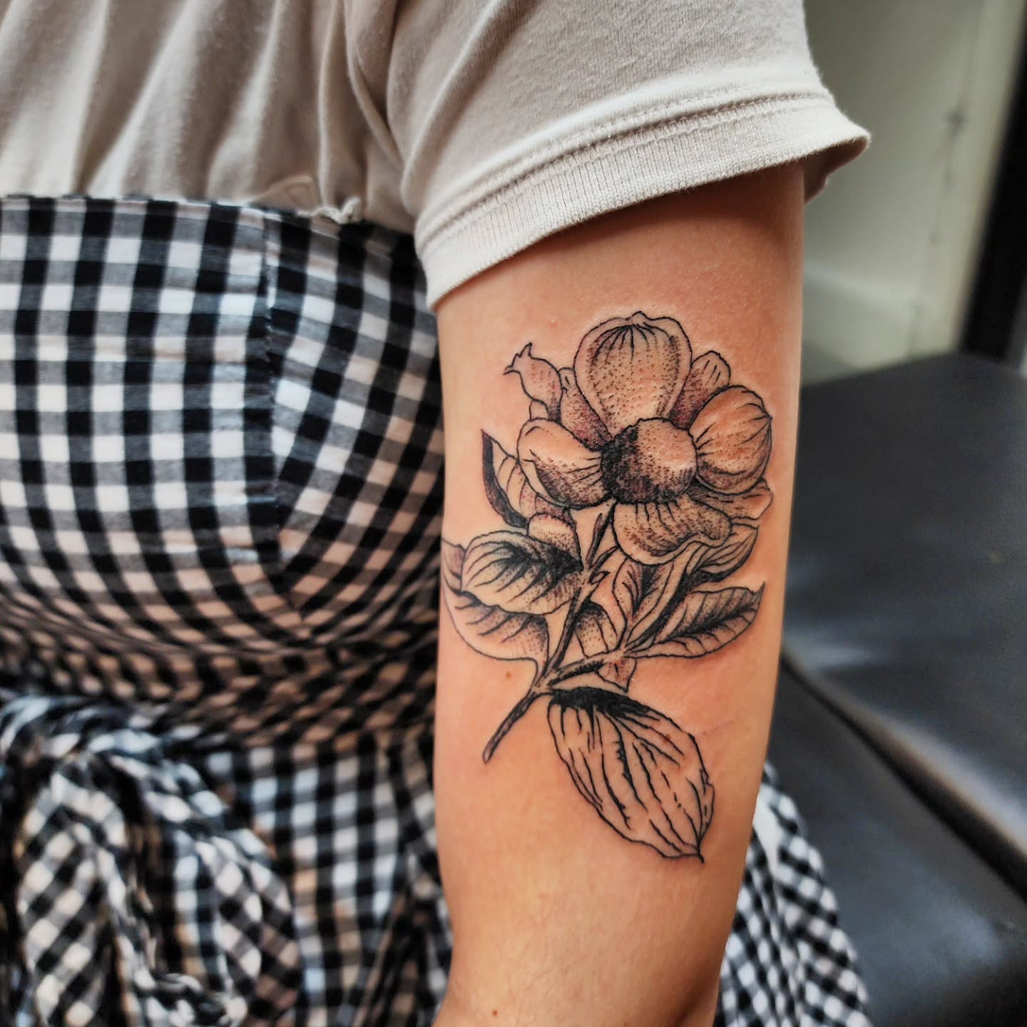 Flower dotwork tattoo on the forearm by julian