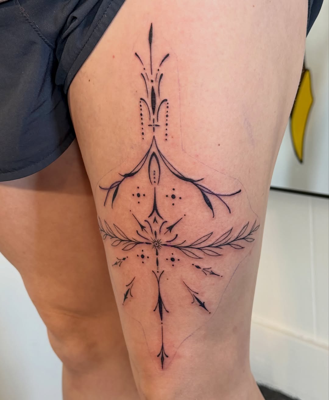 Ornamental mandala ornamental tattoo on the thigh by Sophia, New Carlisle, Ohio