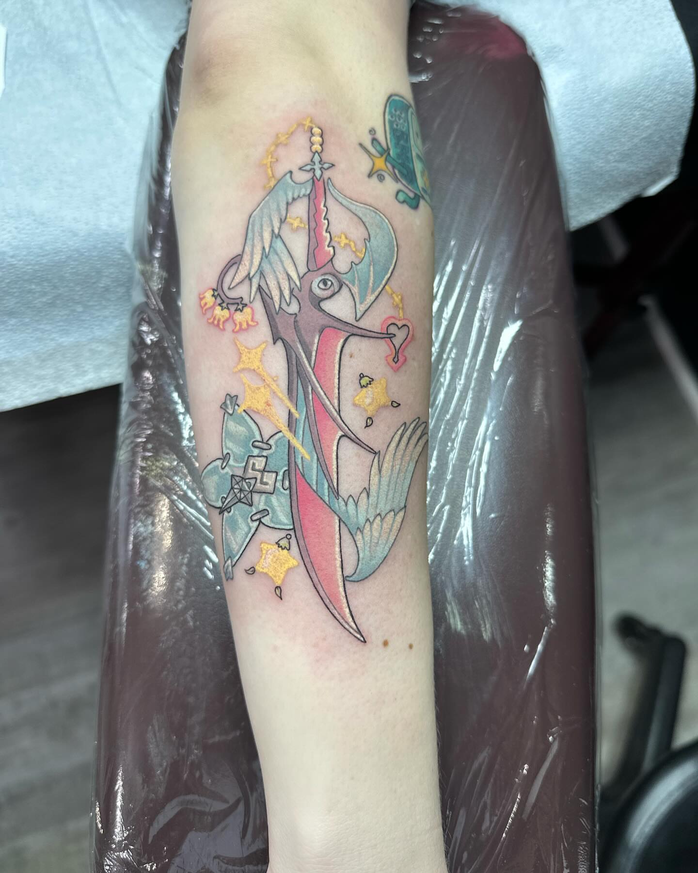 Mermaid new school tattoo on the forearm by Cassandra Rasper-Beard