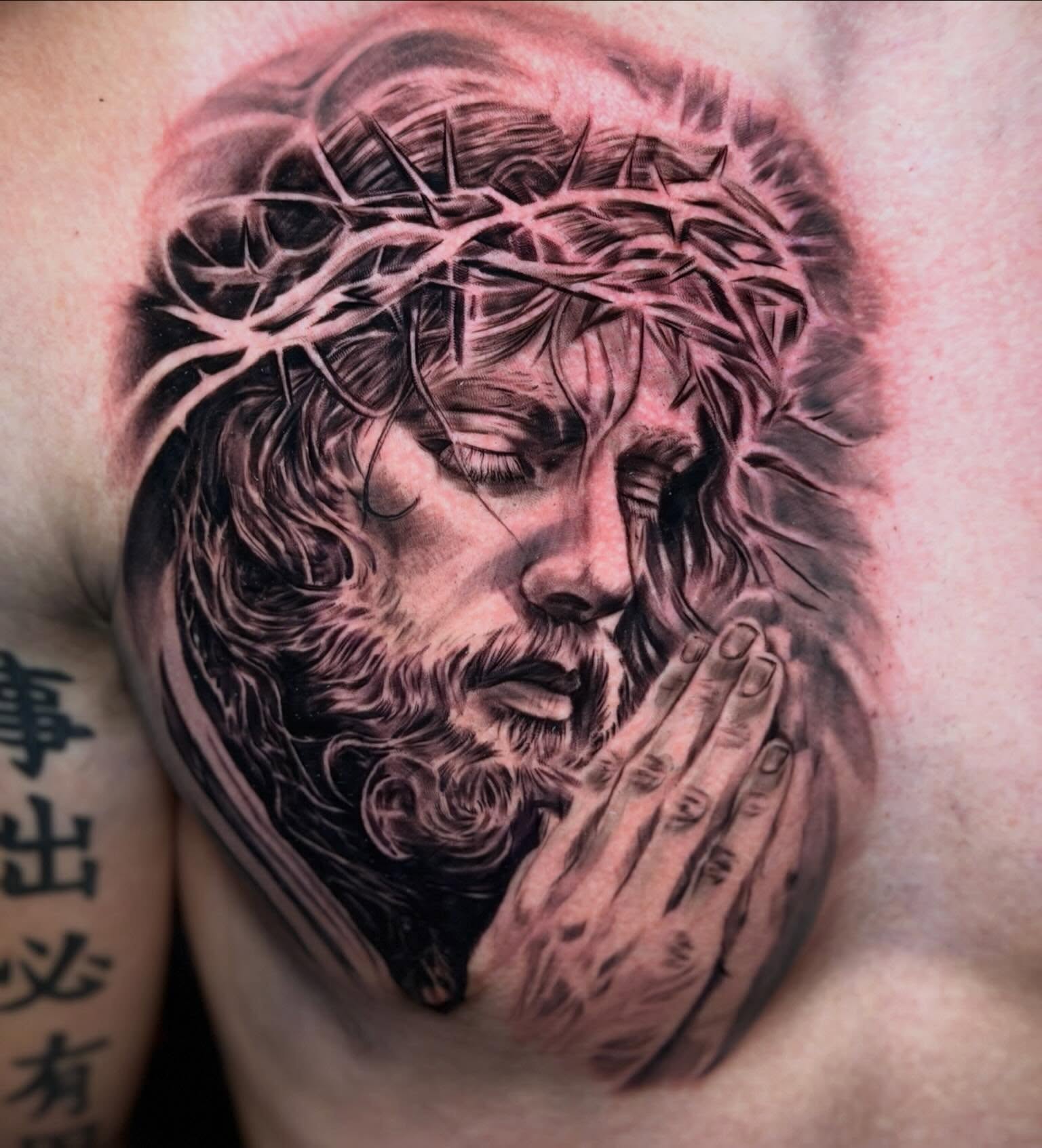 Jesus Christ realism tattoo on the chest by Johnny Scillieri