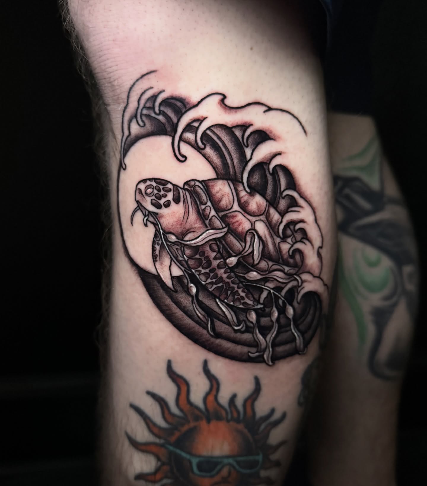 Sea turtle black and grey tattoo on the forearm by Dee Florian