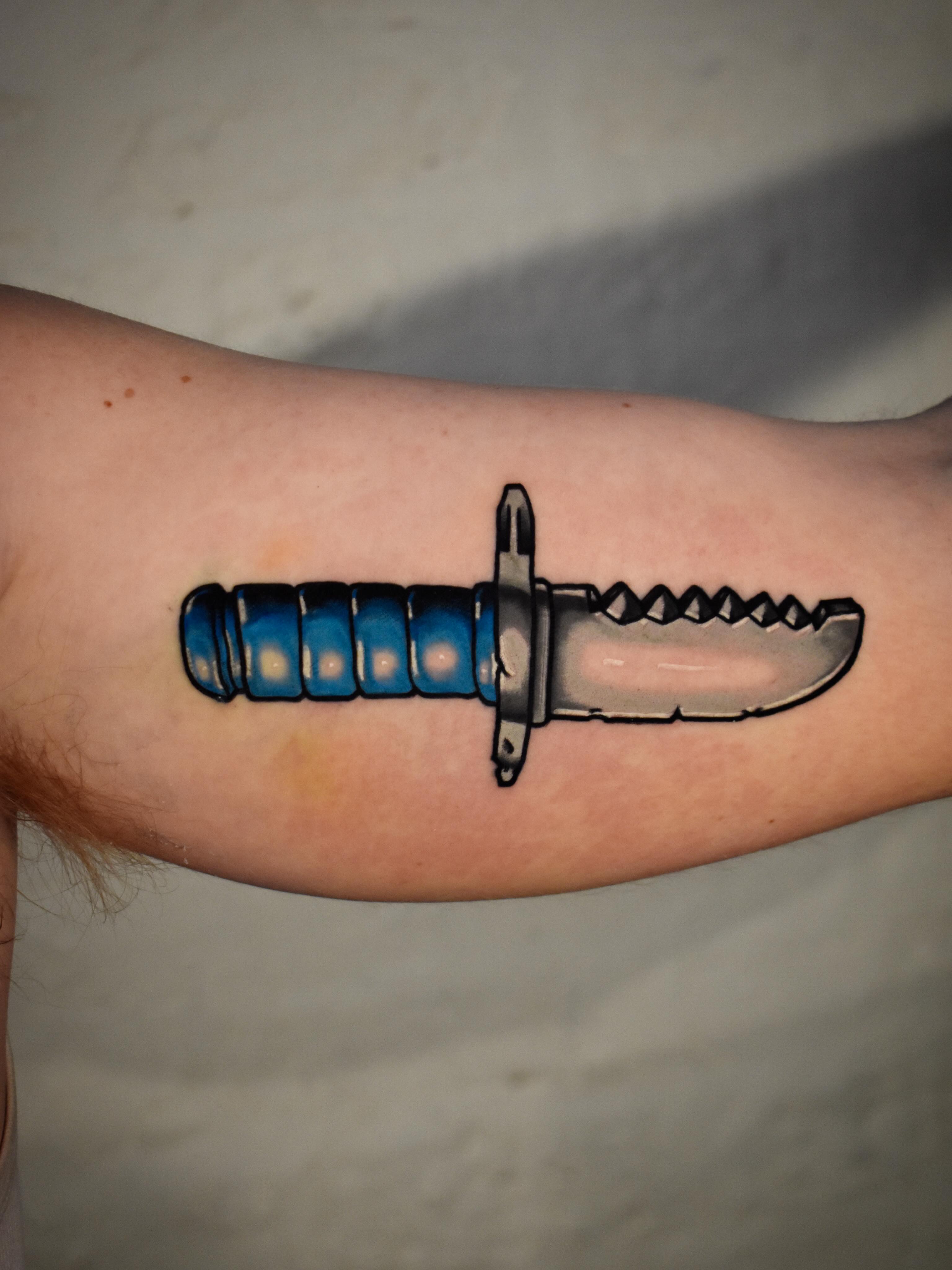 Knife realism tattoo on the forearm by Mackz