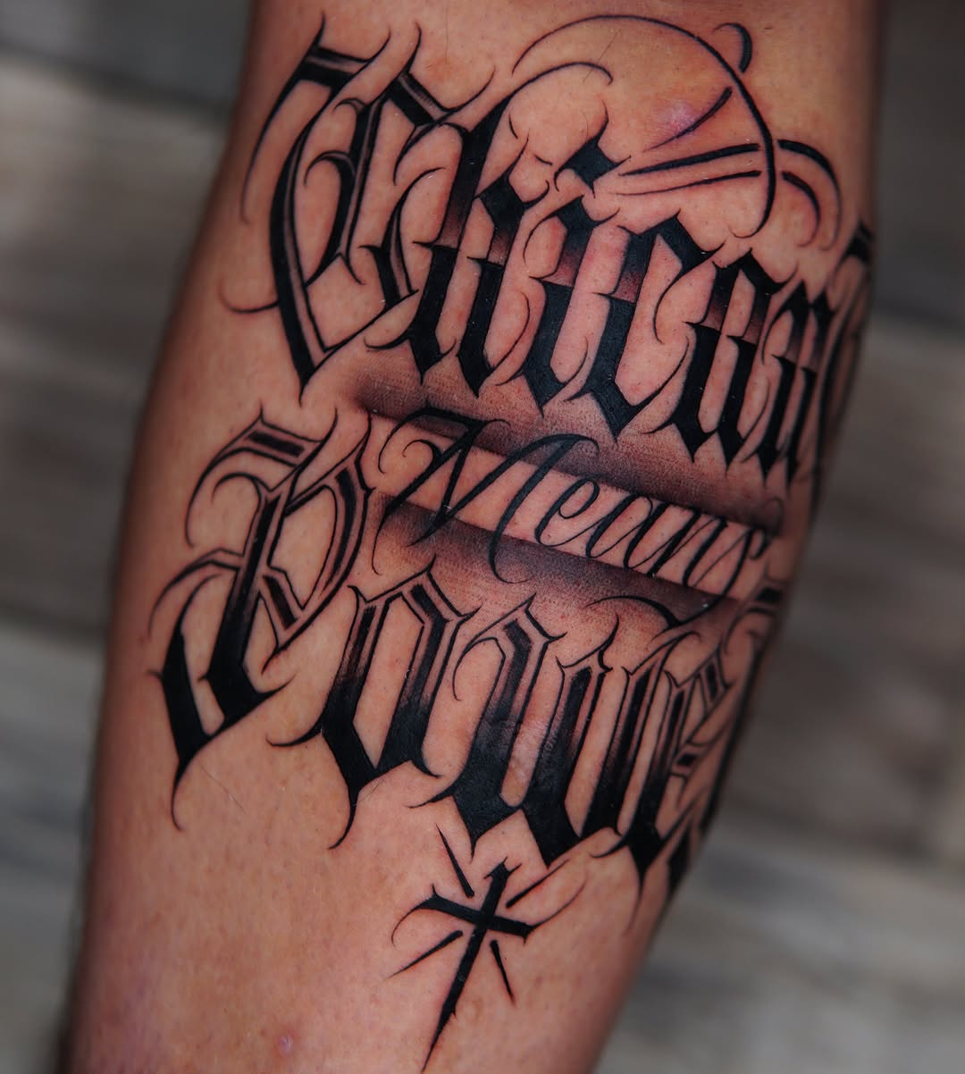 Script lettering Chicano tattoo on the forearm by Atlanta Tattoo Artist, Atlanta, Georgia