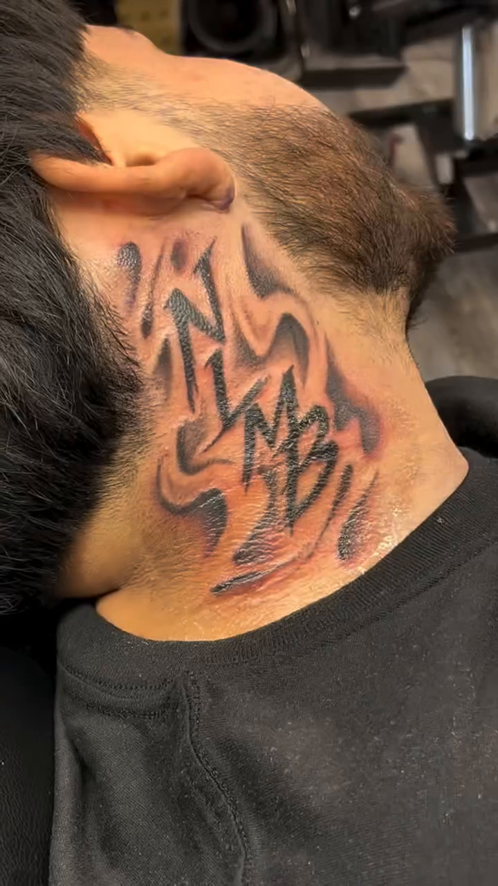 Tattoo by @groovyyinks — lettering_script, black_and_grey