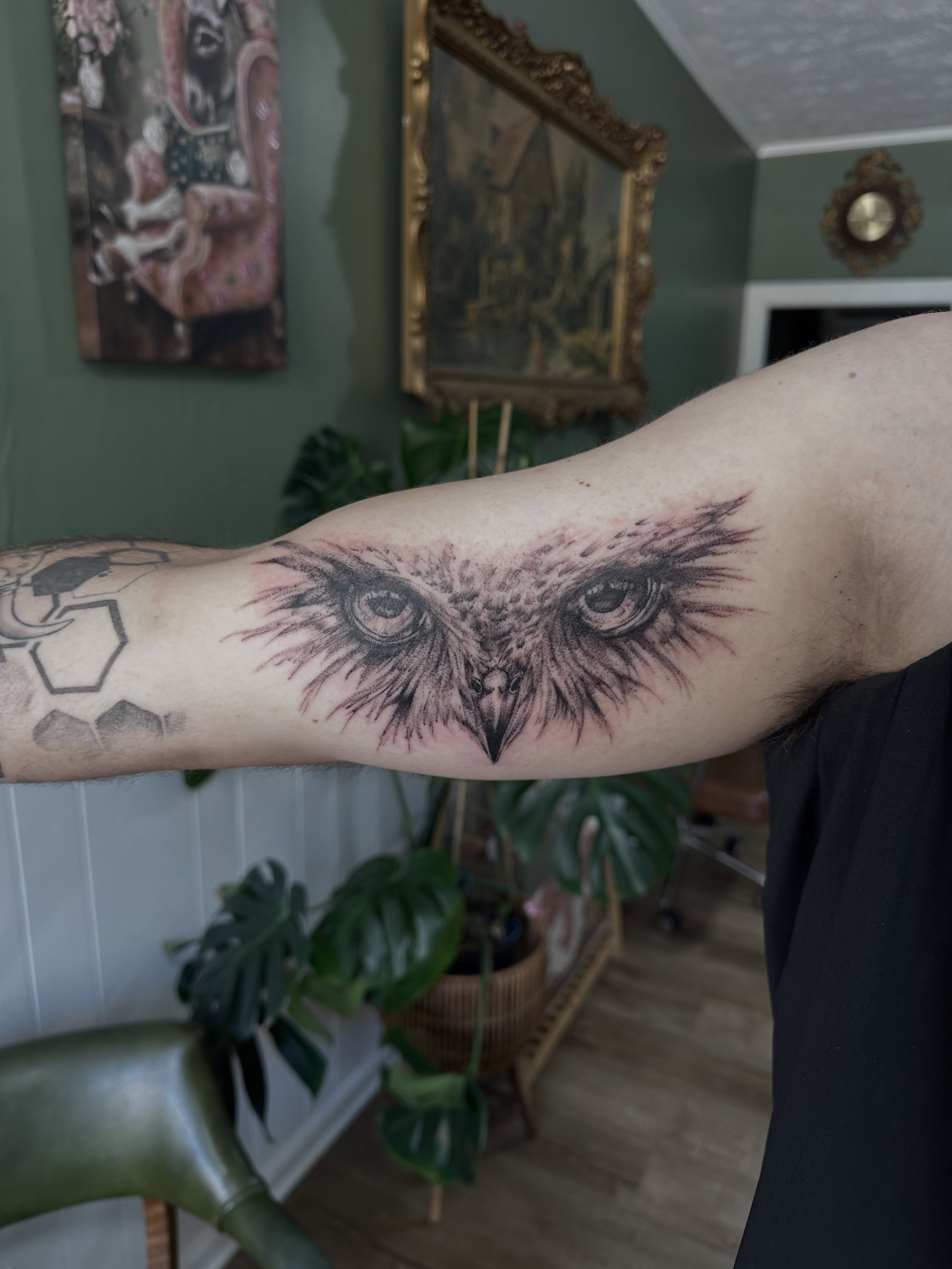 Owl eyes realism tattoo on the forearm by Allexis