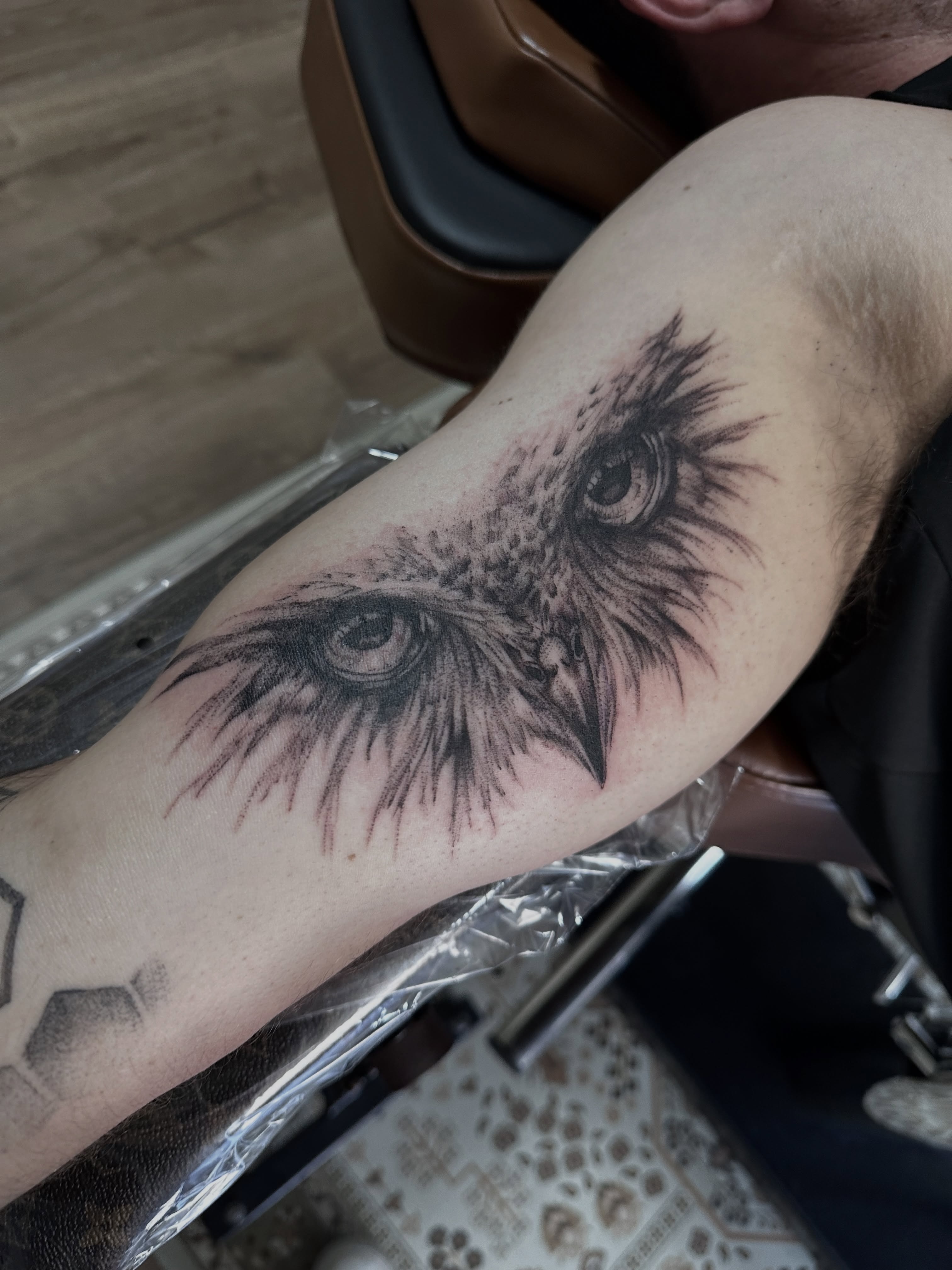 Owl eyes realism tattoo on the forearm by Allexis