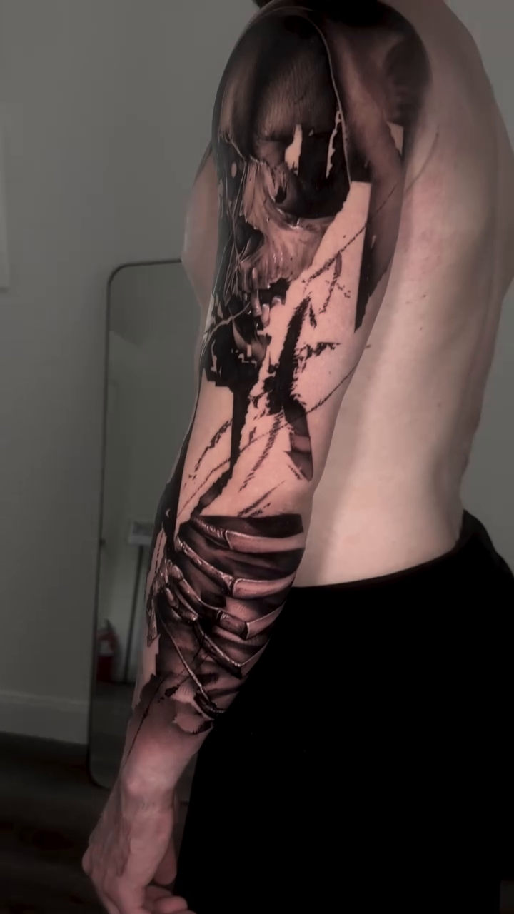 Tattoo by @profet_ink — dark_realism, black_and_grey