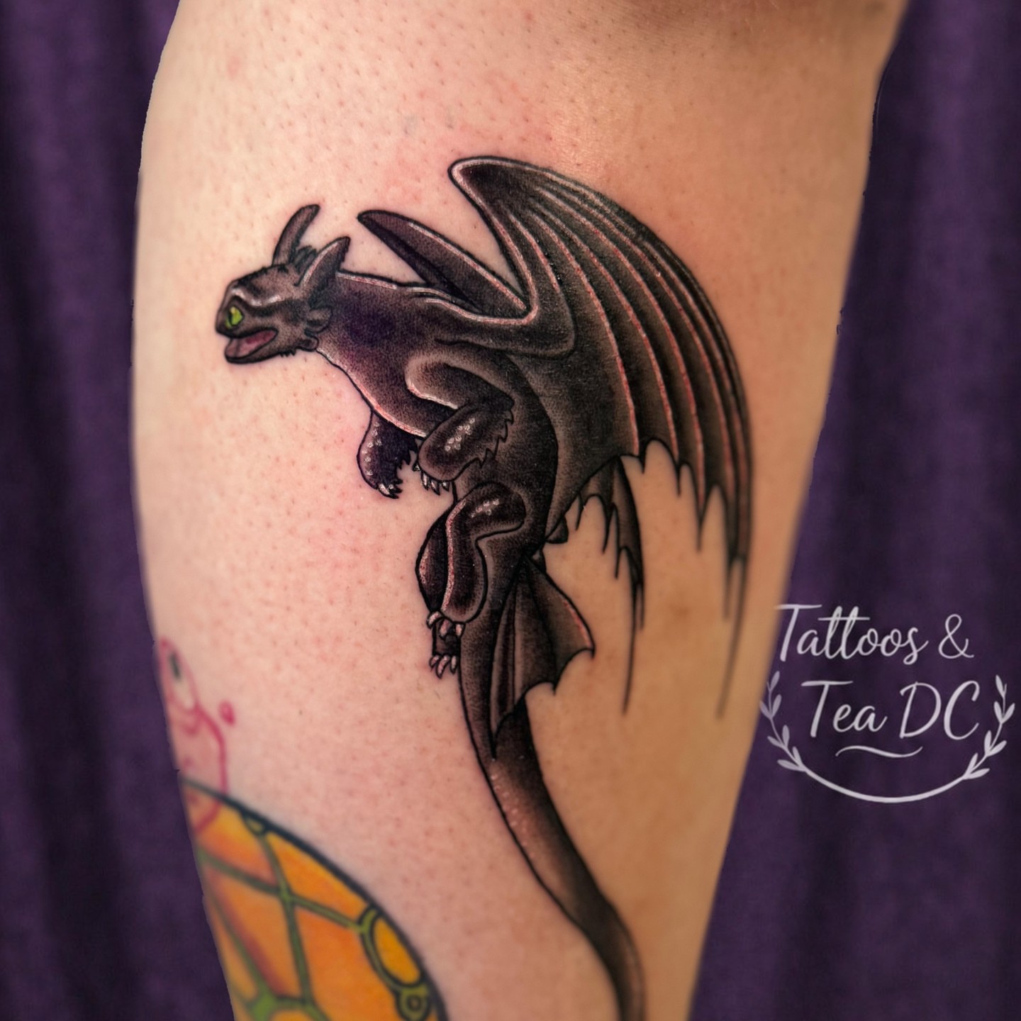 Dragon black and grey tattoo on the forearm by Tattoos & Tea DC, Arlington, Virginia