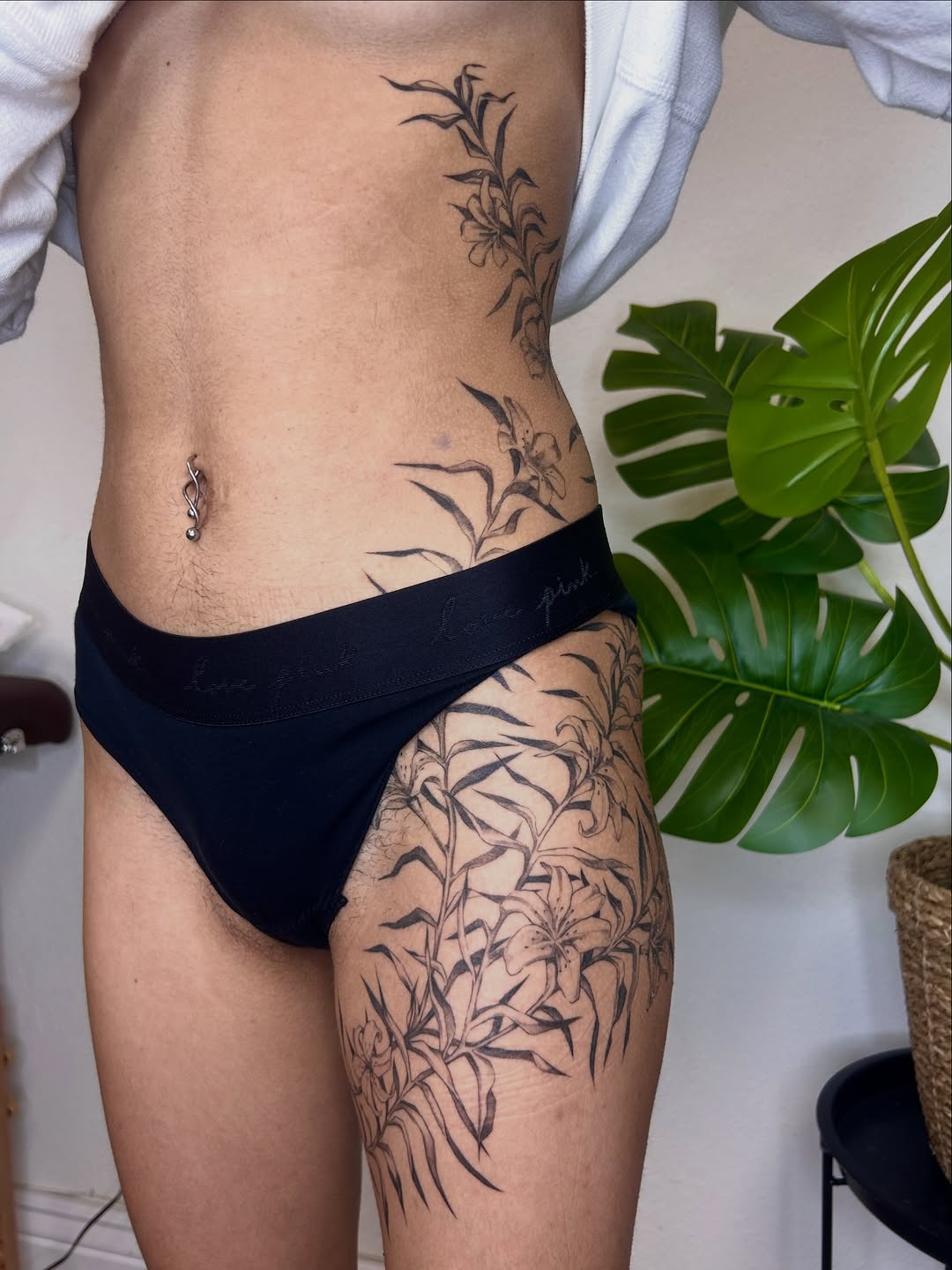 Floral vine cyber sigilism tattoo on the thigh by Miri