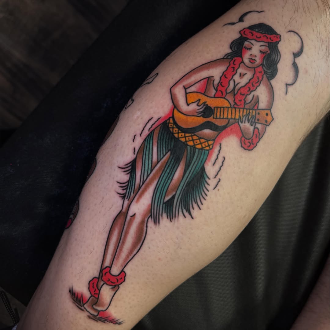 Hula dancer American traditional tattoo on the forearm by Landon Lewis