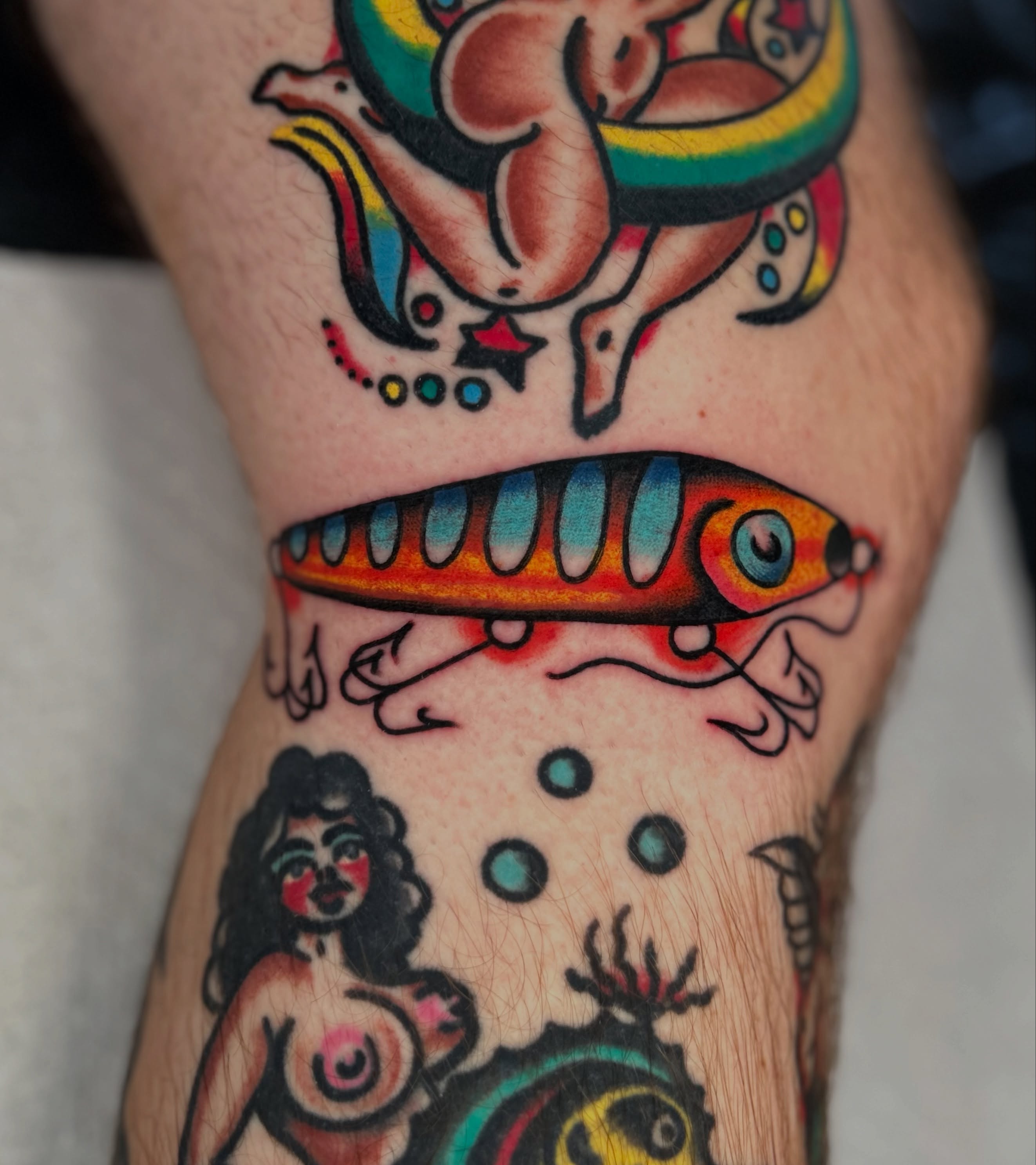 Fishing lure American traditional tattoo on the forearm by Kit Miller, Indianapolis, Indiana