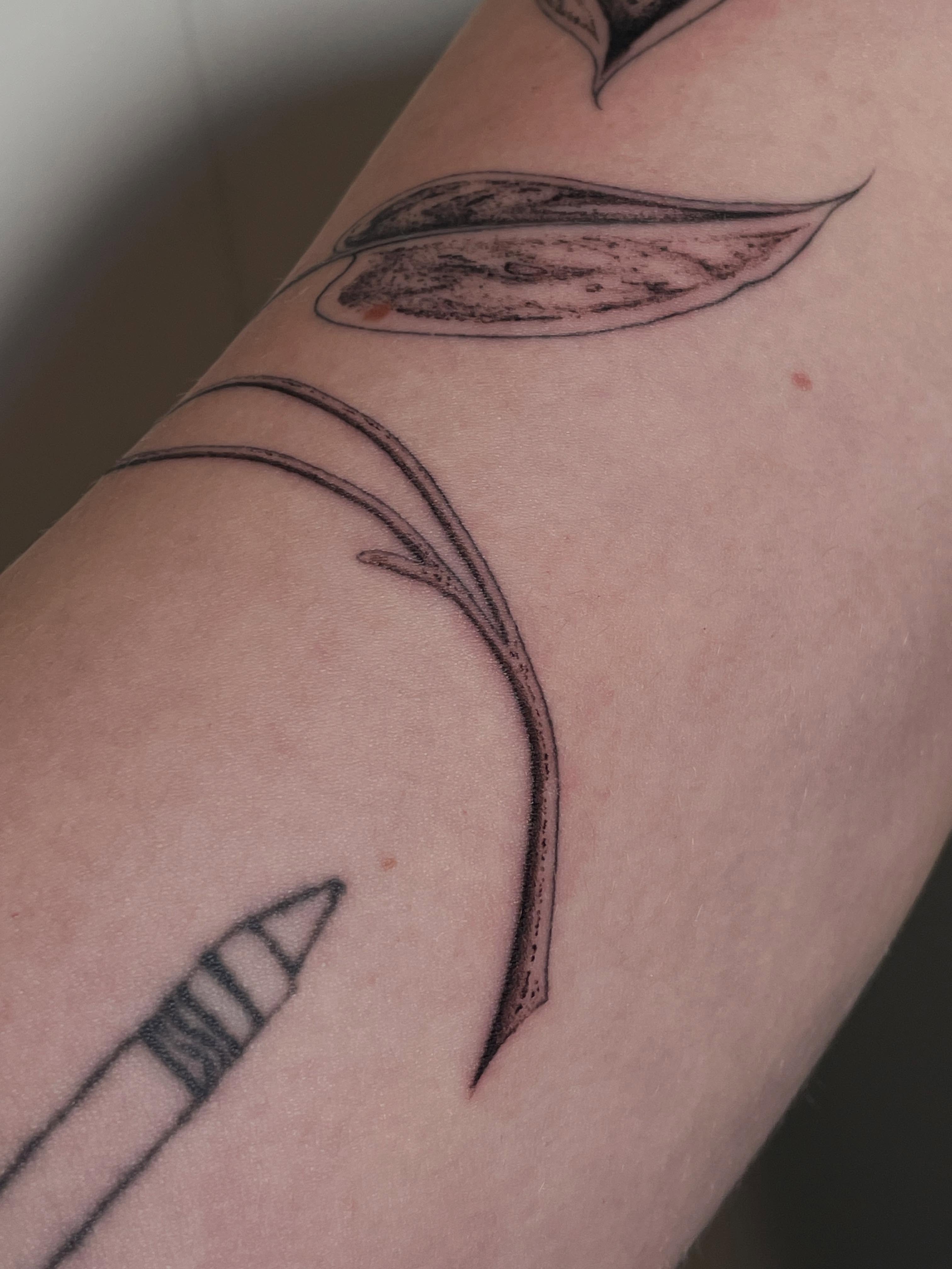 Arrow and feather black and grey tattoo on the forearm by Marjeline González🌈🌞