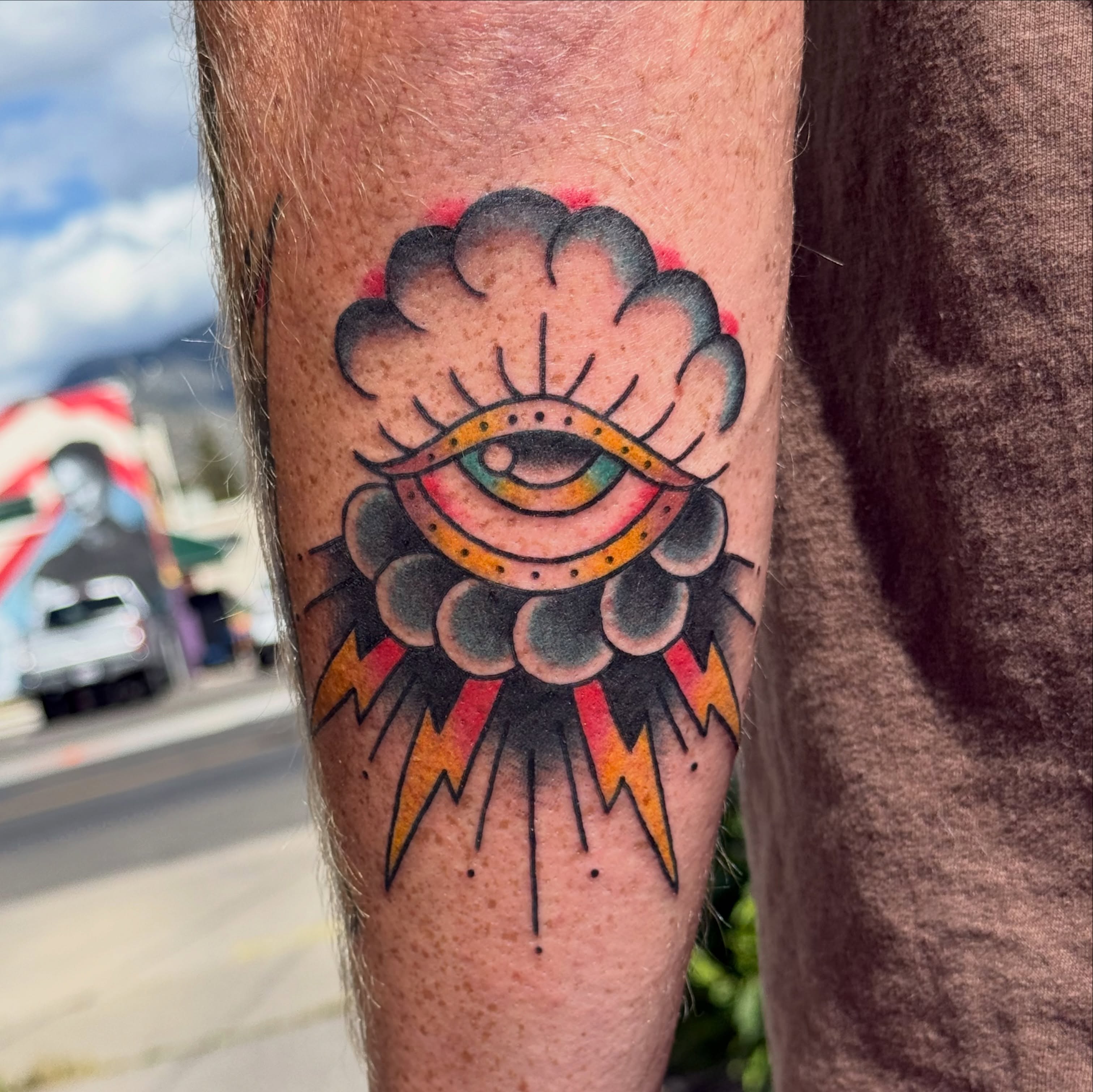 Eye with cloud American traditional tattoo on the forearm by Kaysen