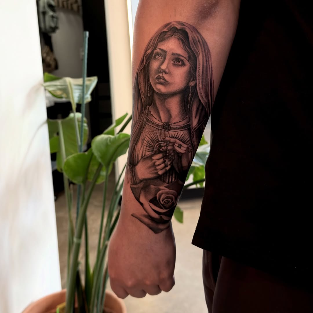 Tattoo by @joe.cruz_tattoos — realism, black_and_grey