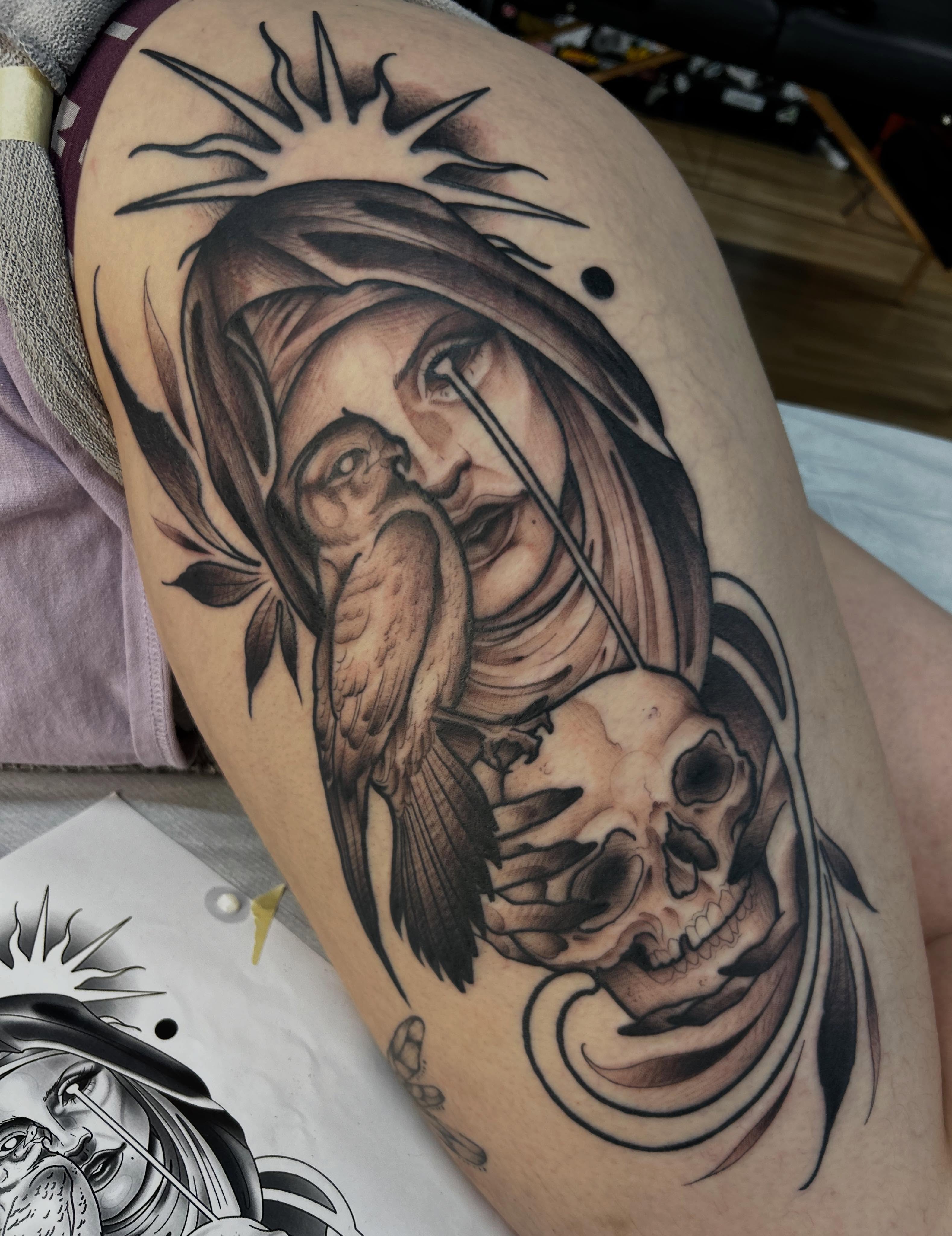 Woman with bird and skull realism tattoo on the thigh by Kayla Fay, Baton Rouge, Louisiana