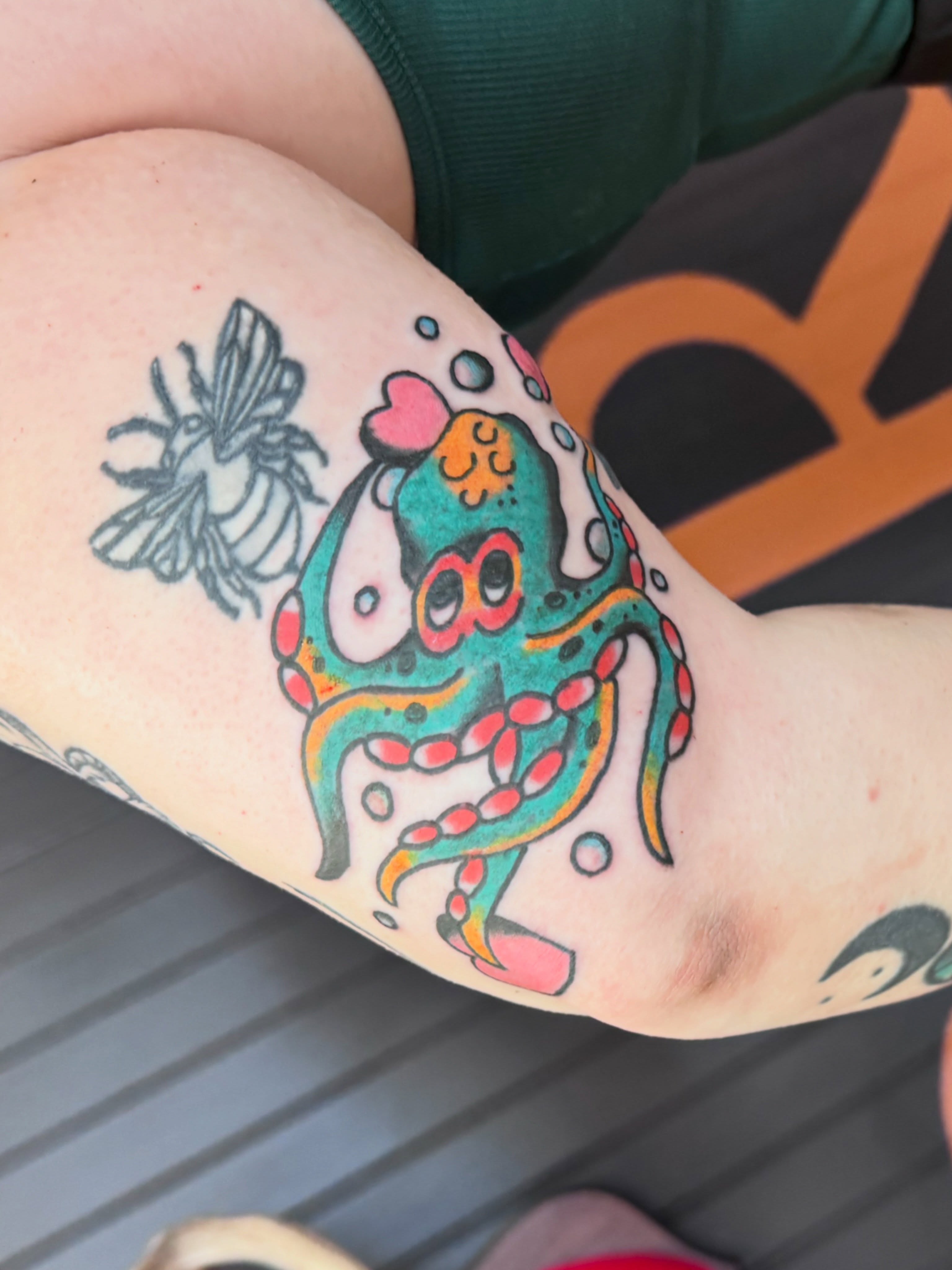Octopus new school tattoo on the thigh by Justin Chapman, Des Moines, Iowa