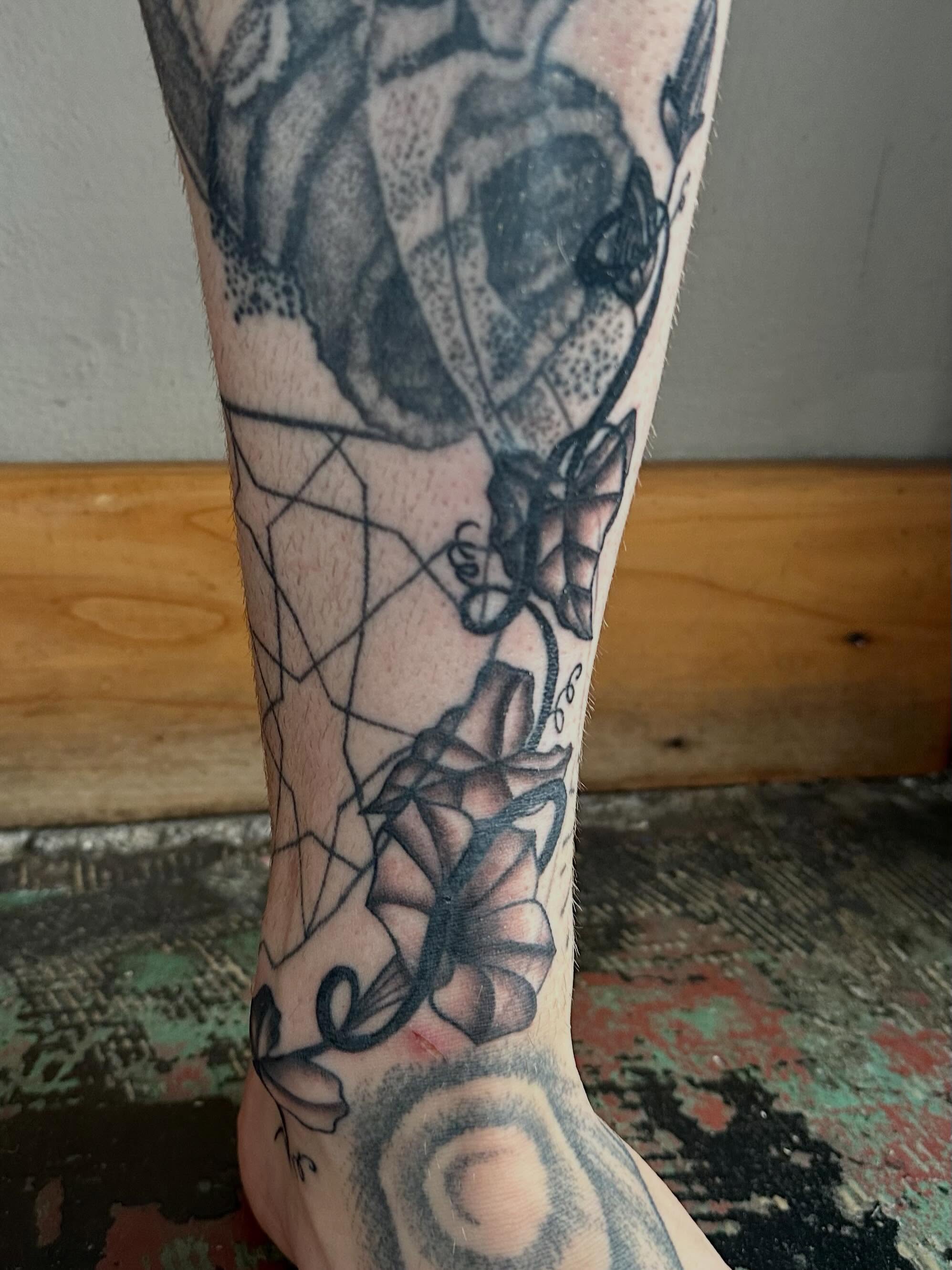 Geometric roses geometric tattoo on the forearm by Jadelin, San Francisco, California