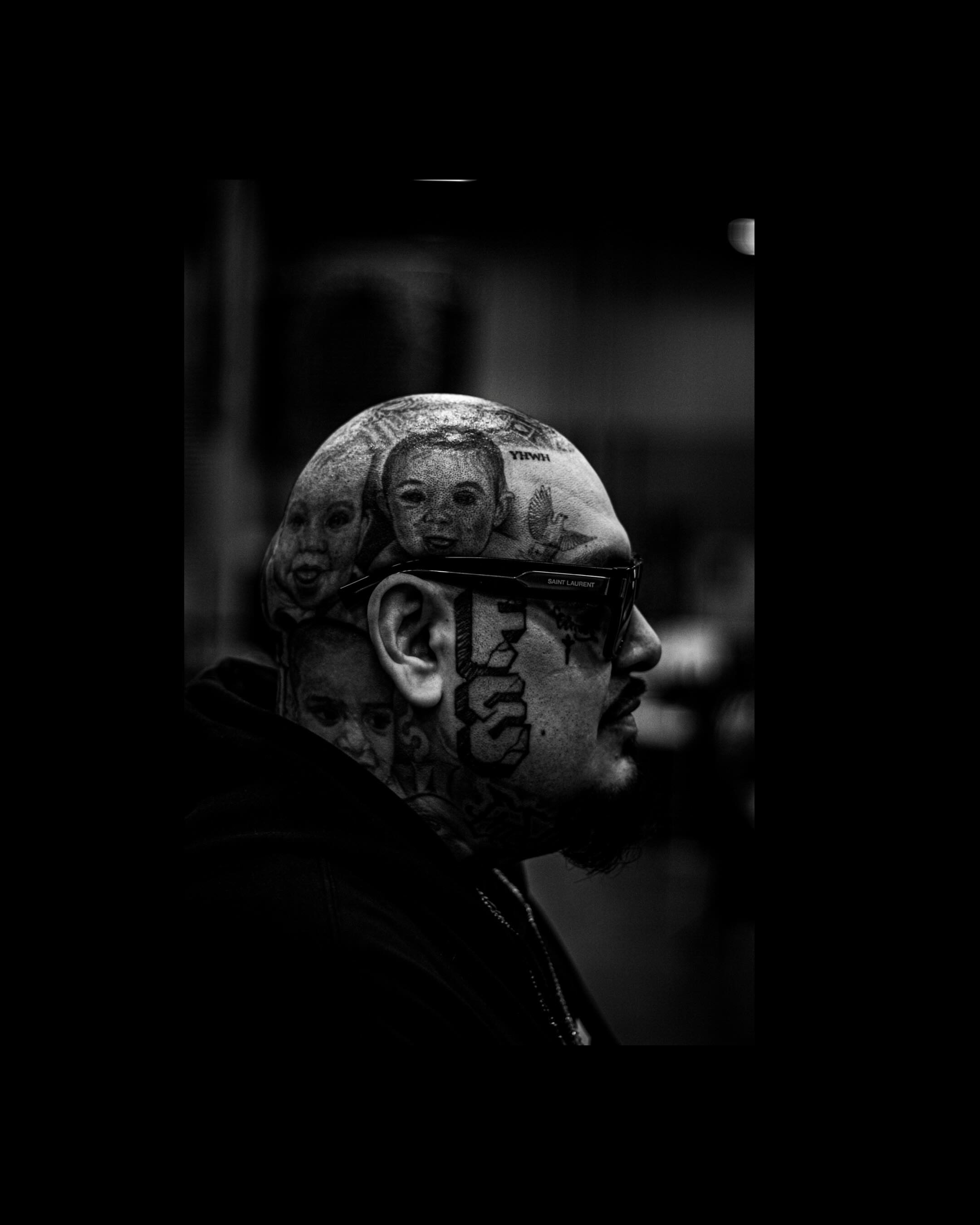 Portrait black and grey tattoo on the head by F e A R