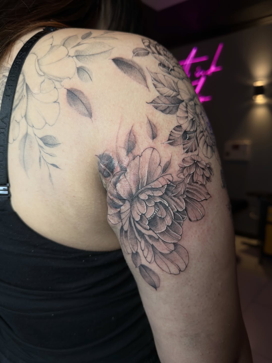 Floral arrangement dotwork tattoo on the shoulder by Vu Nguyen