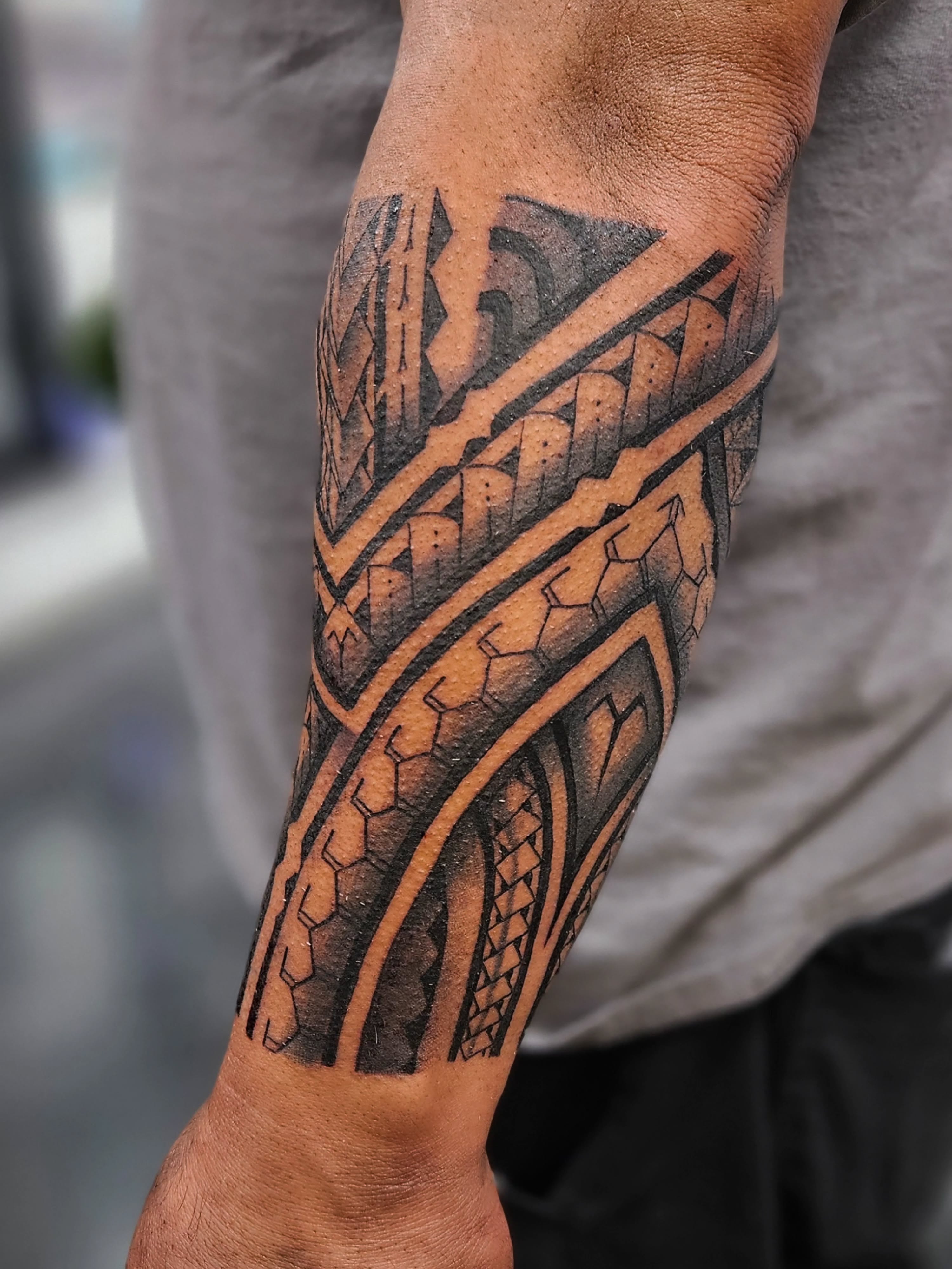 Tribal pattern tribal tattoo on the forearm by Jo'el Acoba