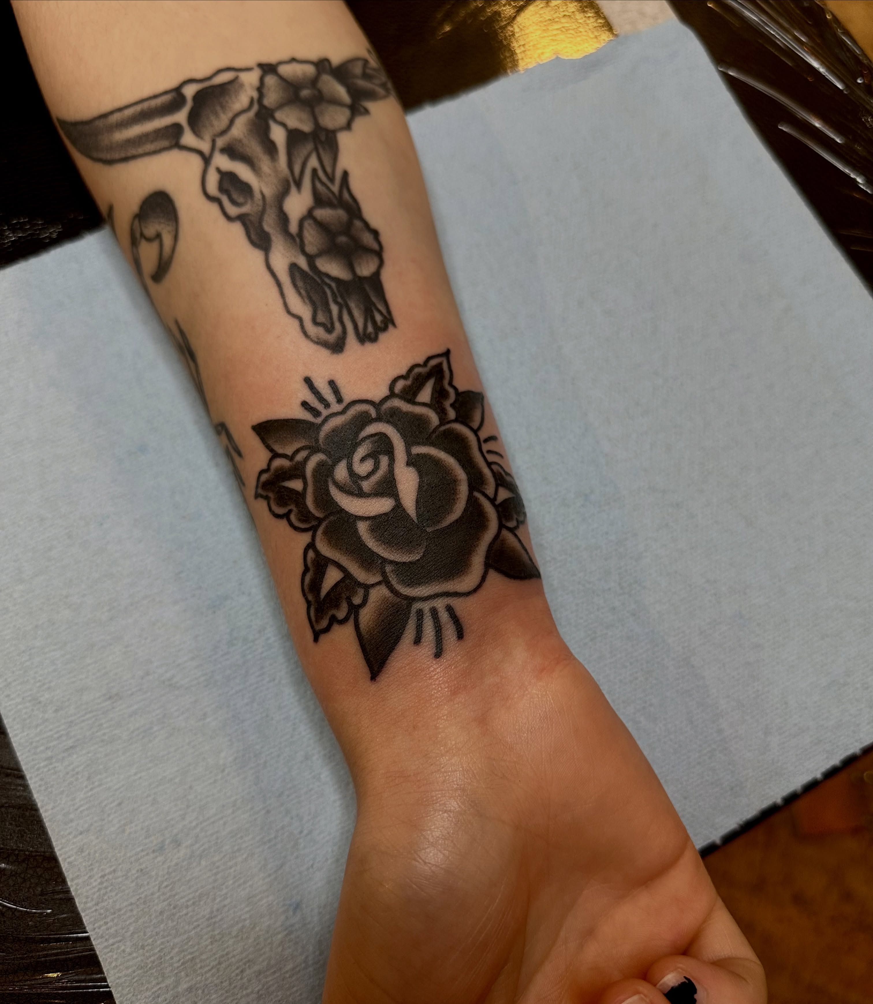 Rose black and grey tattoo on the forearm by teddy, Portland, Oregon