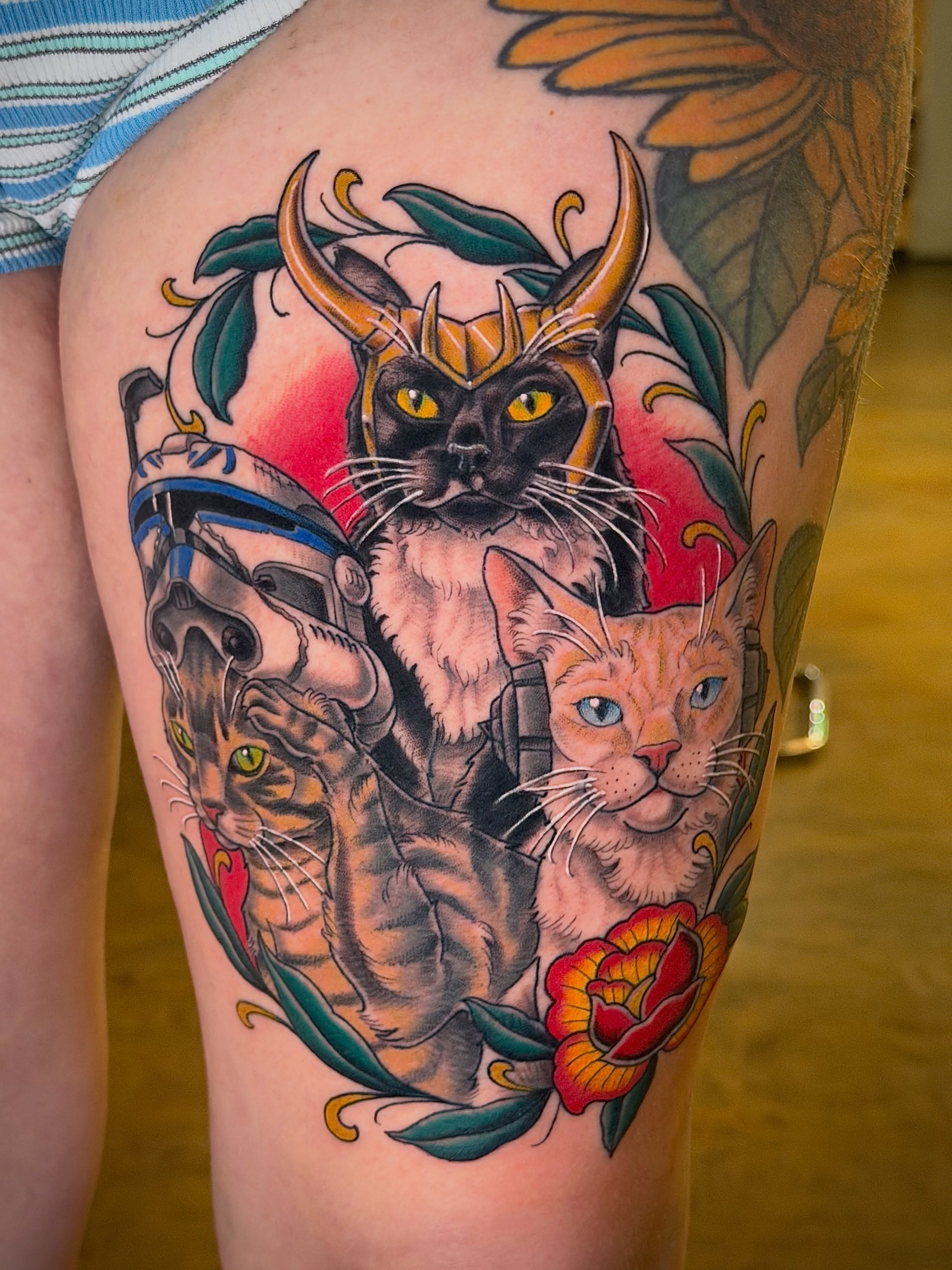 Cats and fantasy creatures American traditional tattoo on the thigh by Thad Collis