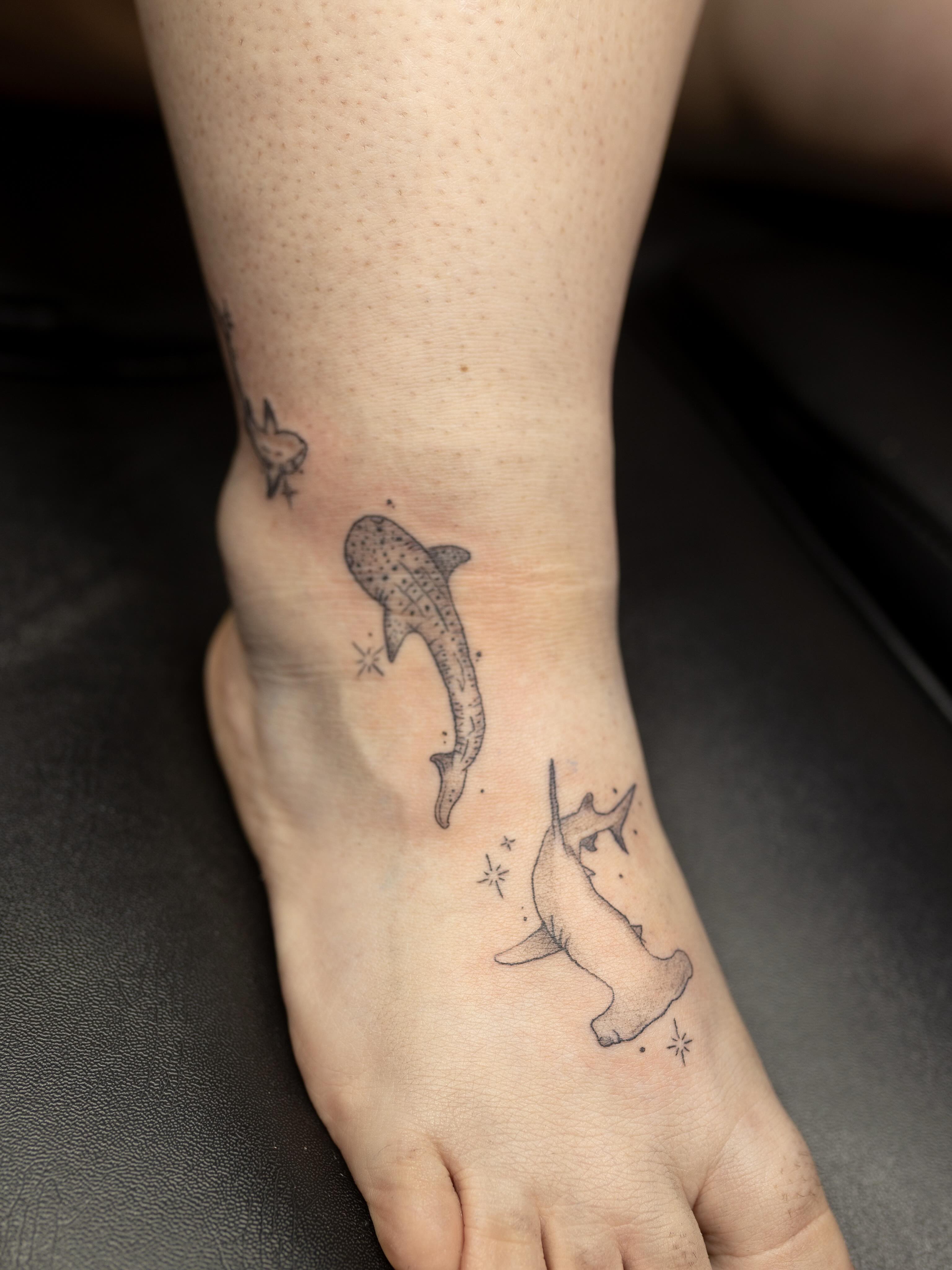 Sharks dotwork tattoo on the foot by Kelsie