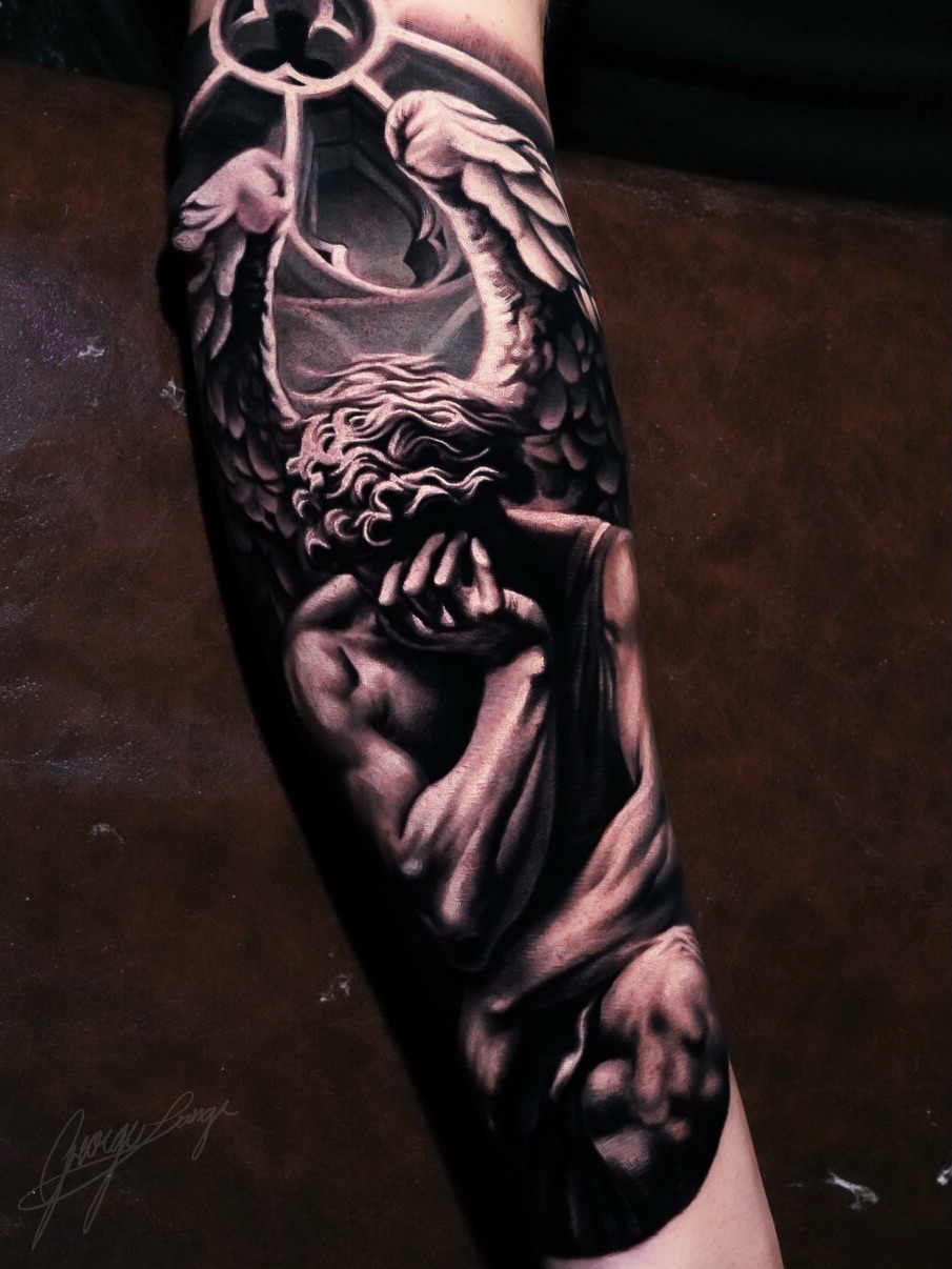 Angelic figure in grief realism tattoo on the forearm by George Lange