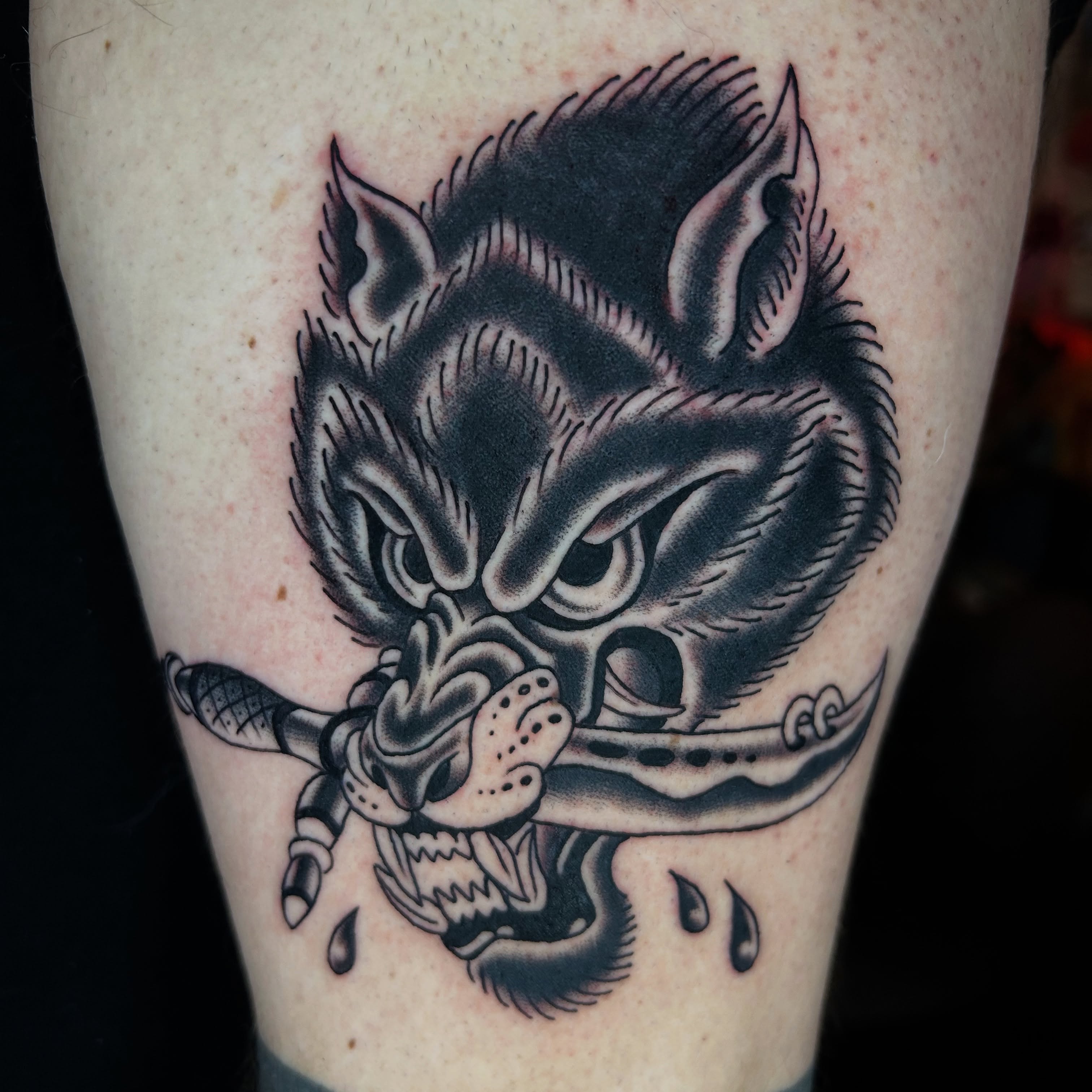 Demon head black and grey tattoo on the forearm by Kurt, Somerville, Massachusetts