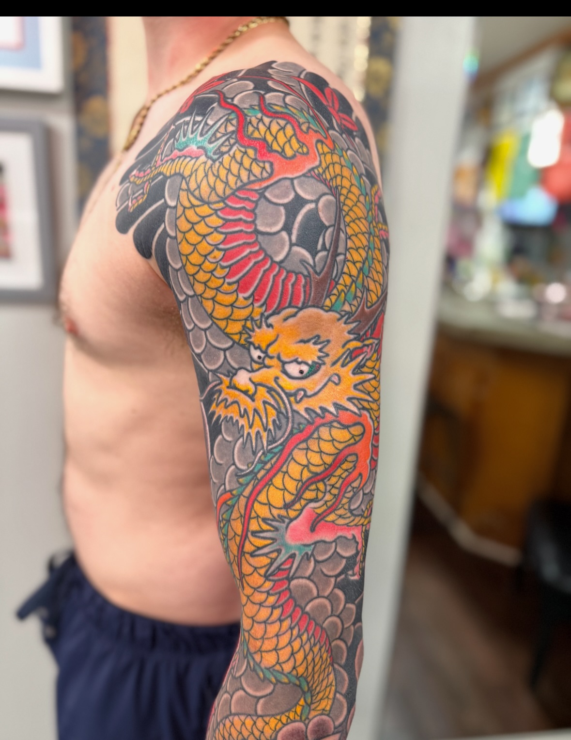 Dragon japanese irezumi tattoo on the upper arm by Jason Eisenberg