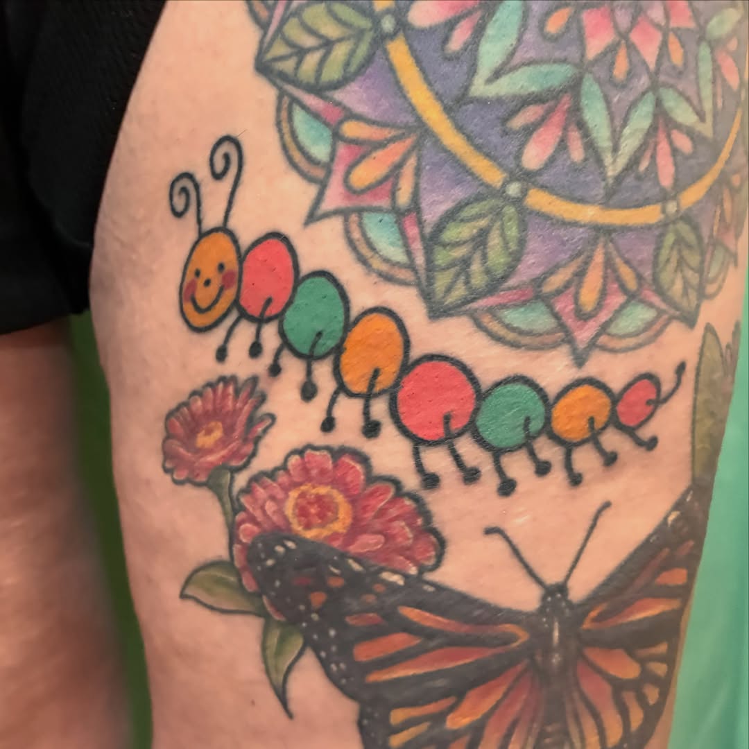 Caterpillar and butterfly new school tattoo on the forearm by Kaily McKee