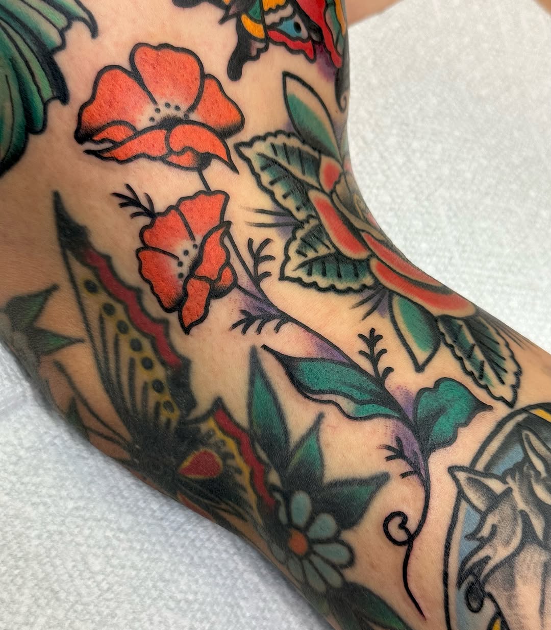 Floral bouquet American traditional tattoo on the forearm by Amanda Bonhomme, Las Vegas, Nevada