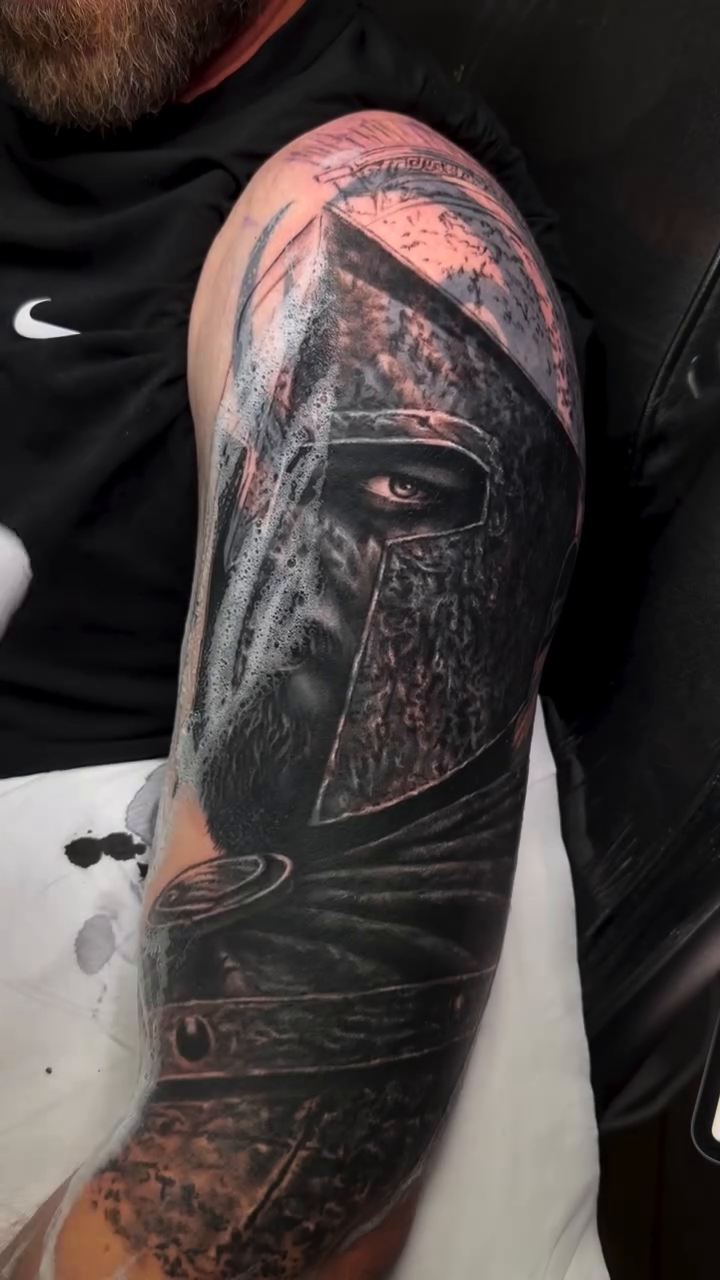 Spartan helmet realism tattoo by Cipri Suciu